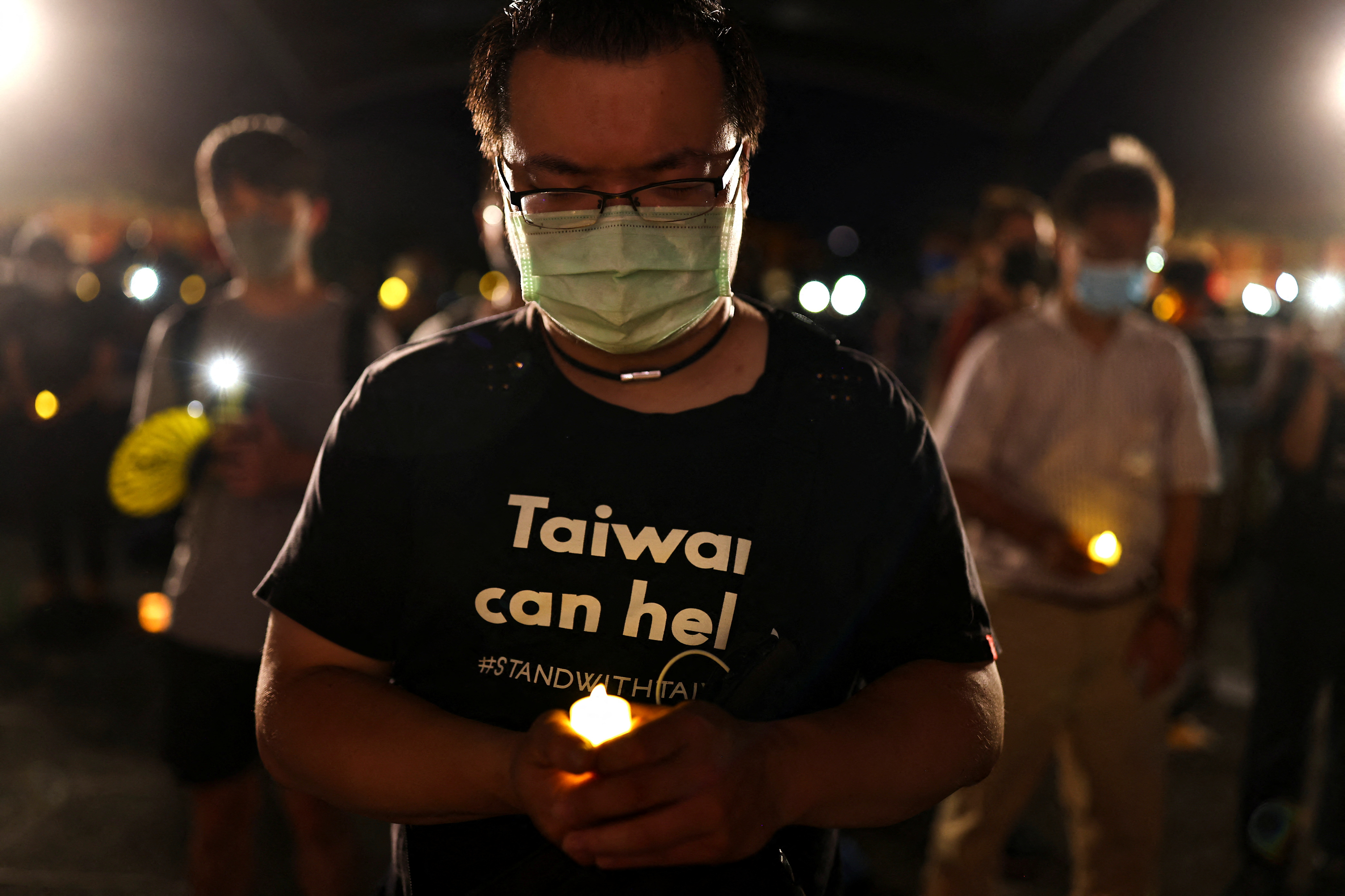 Taiwanese gather to commemorate the 33rd anniversary of Beijing's Tiananmen crackdown in Taipei