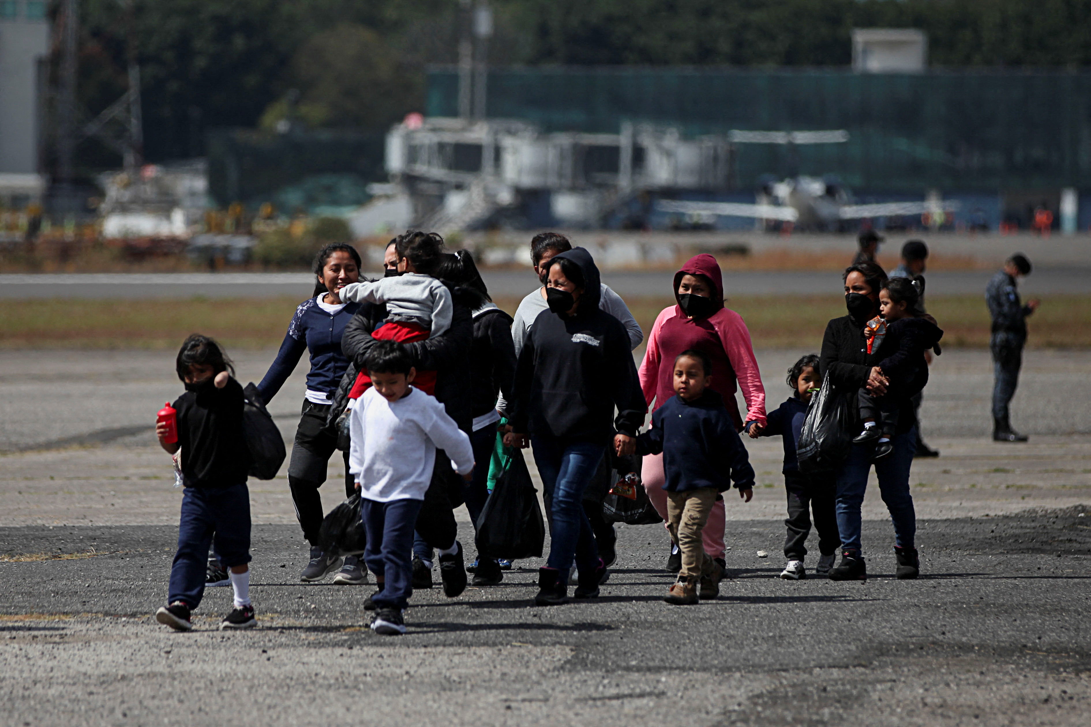 Guatemalans deported from the U.S. arrive to the Air Force base in Guatemala City