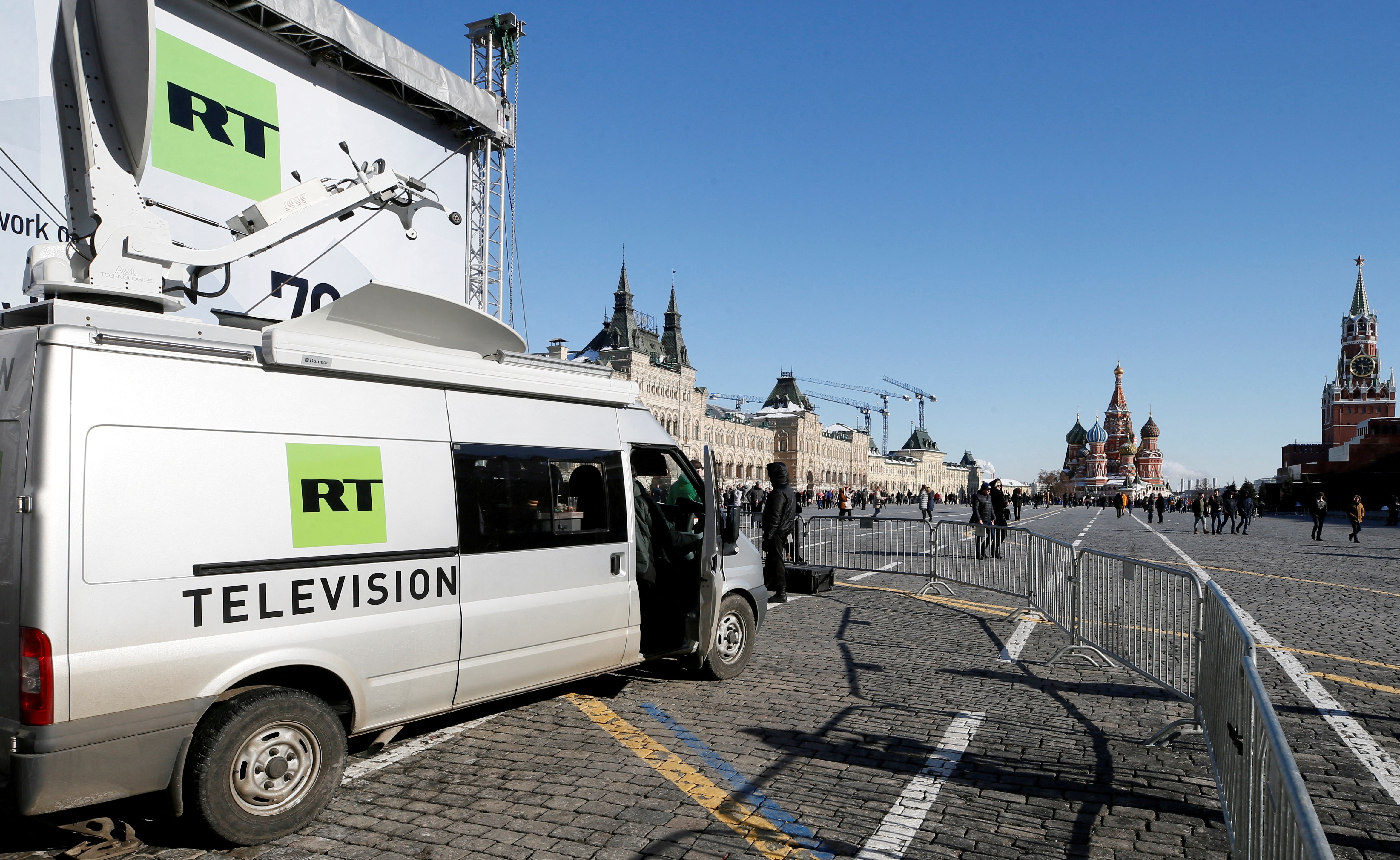 Vehicles of Russian state-controlled broadcaster RT are seen in Red Square in central Moscow