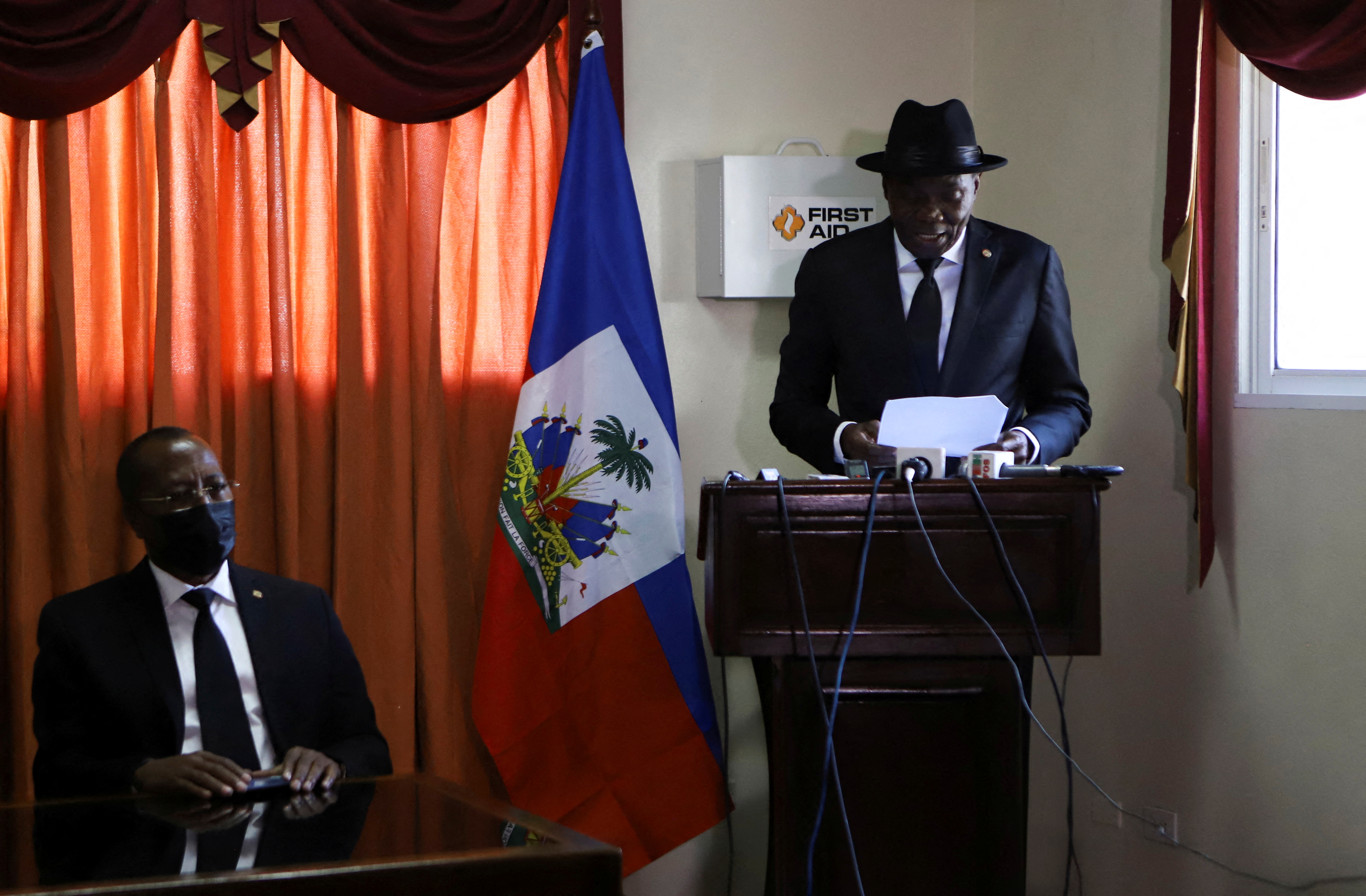 Haiti's outgoing Senate leader Joseph Lambert with Senator Pierre Francois Syldor, speaks at a news conference where he announced his intention to continue holding sessions as his term expires, in Port-au-Prince, Haiti January 10, 2022. REUTERS/Ralph Tedy Erol