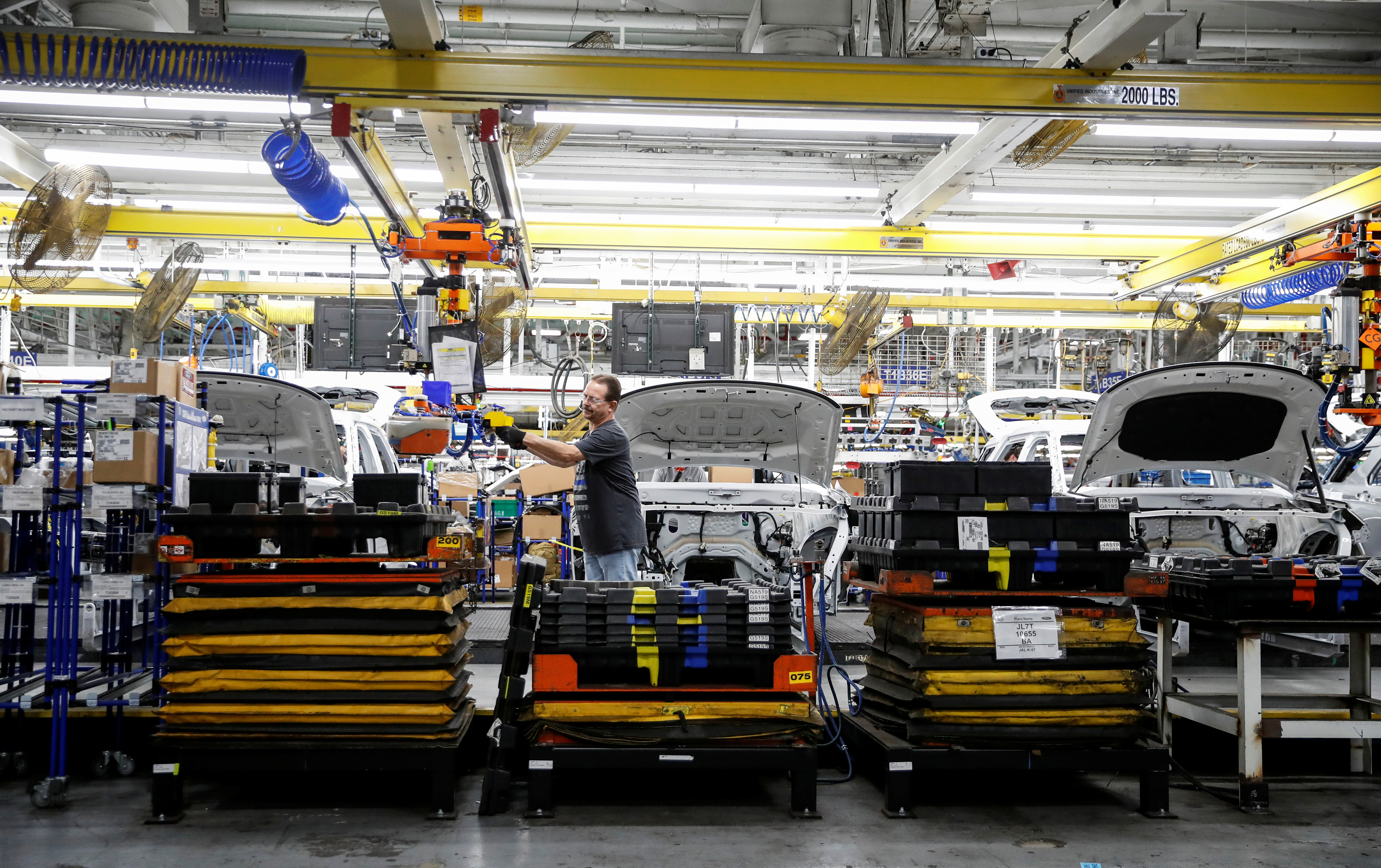 A worker builds a 2020 Ford Explorer car at Ford's Chicago Assembly Plant in Chicago