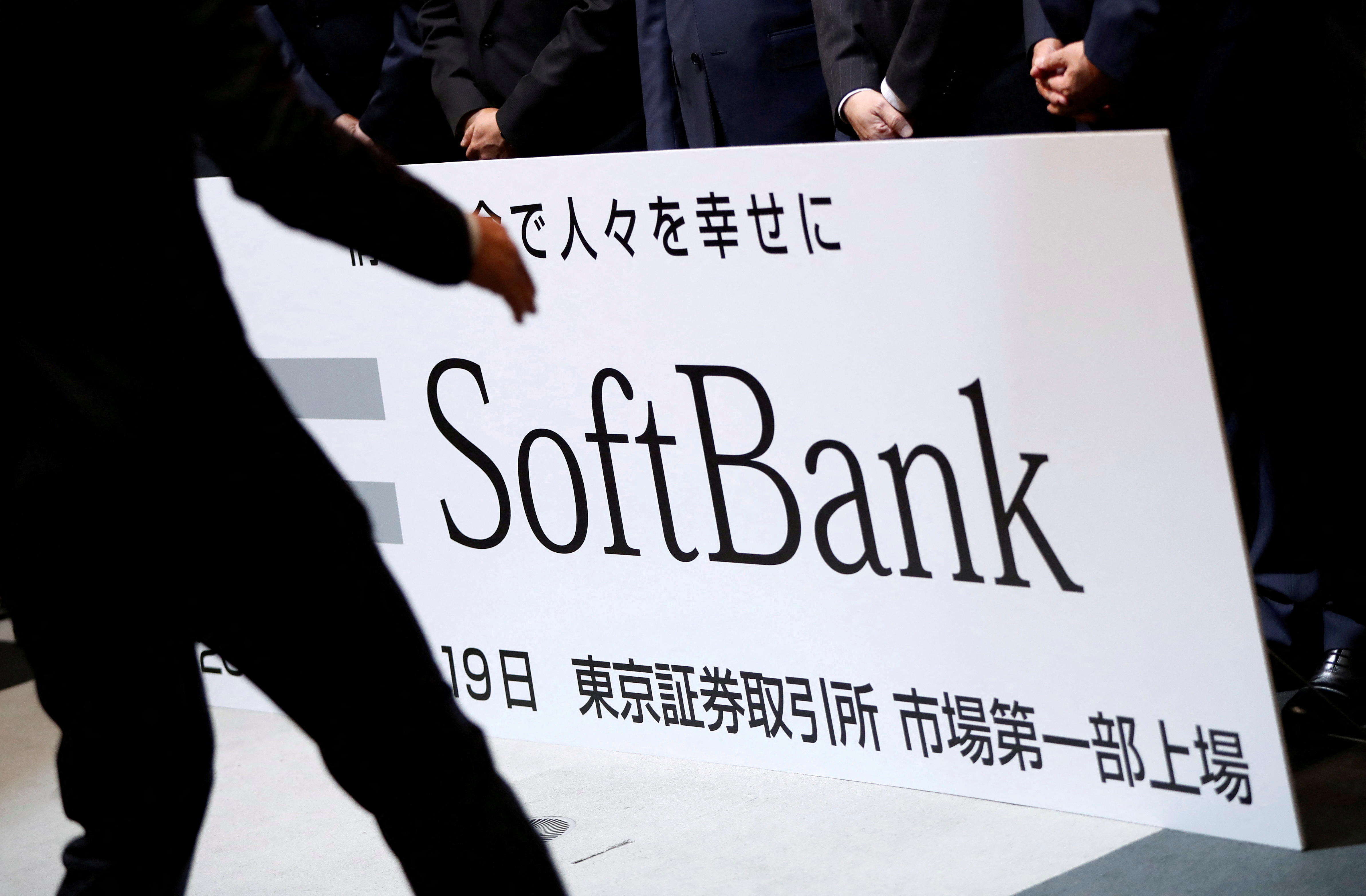 SoftBank Corp. placard is prepared during a ceremony to mark the company's debut on the Tokyo Stock Exchange in Tokyo