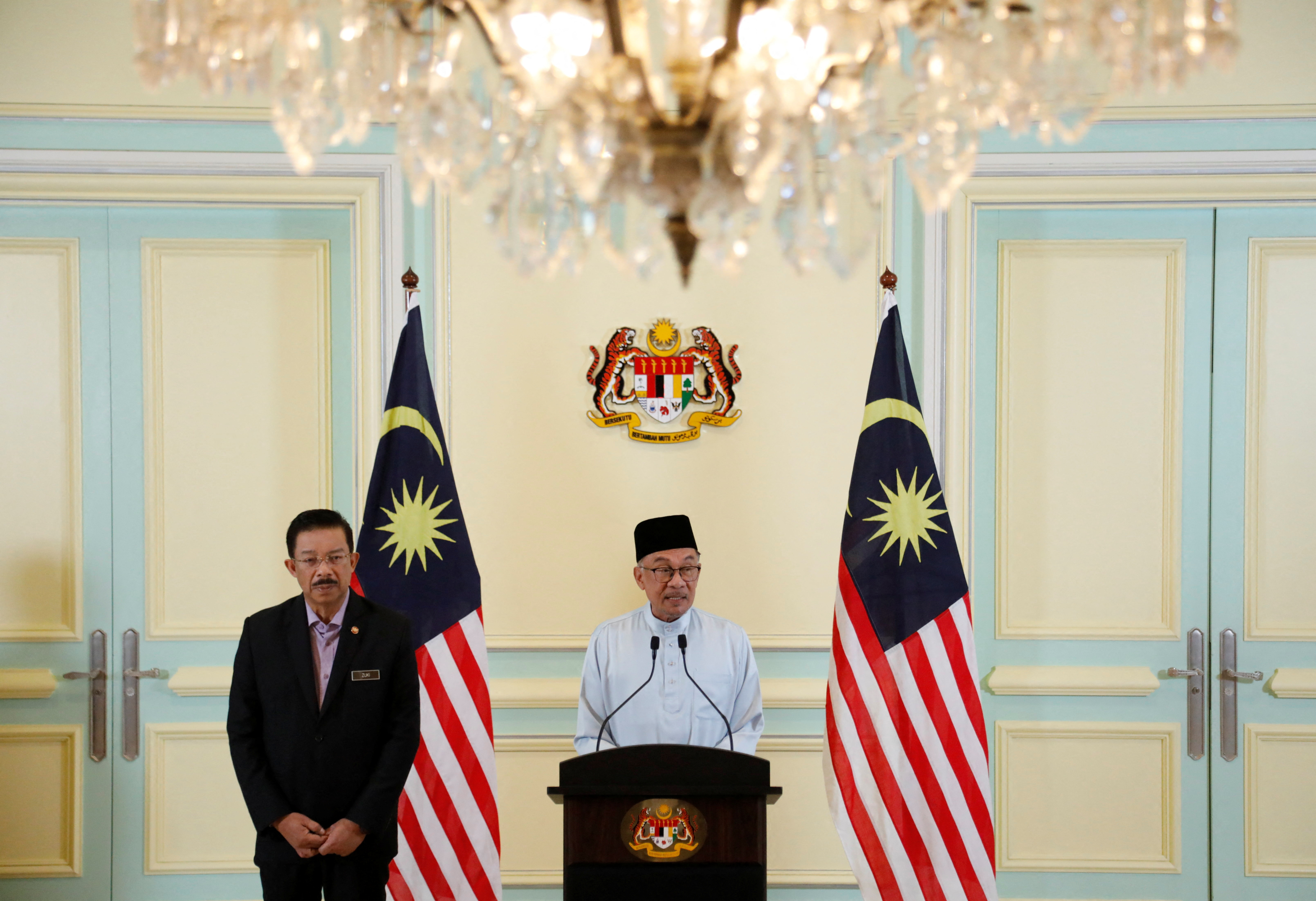Malaysian Prime Minister Anwar Ibrahim speaks during a news conference announcing his cabinet at Putrajaya