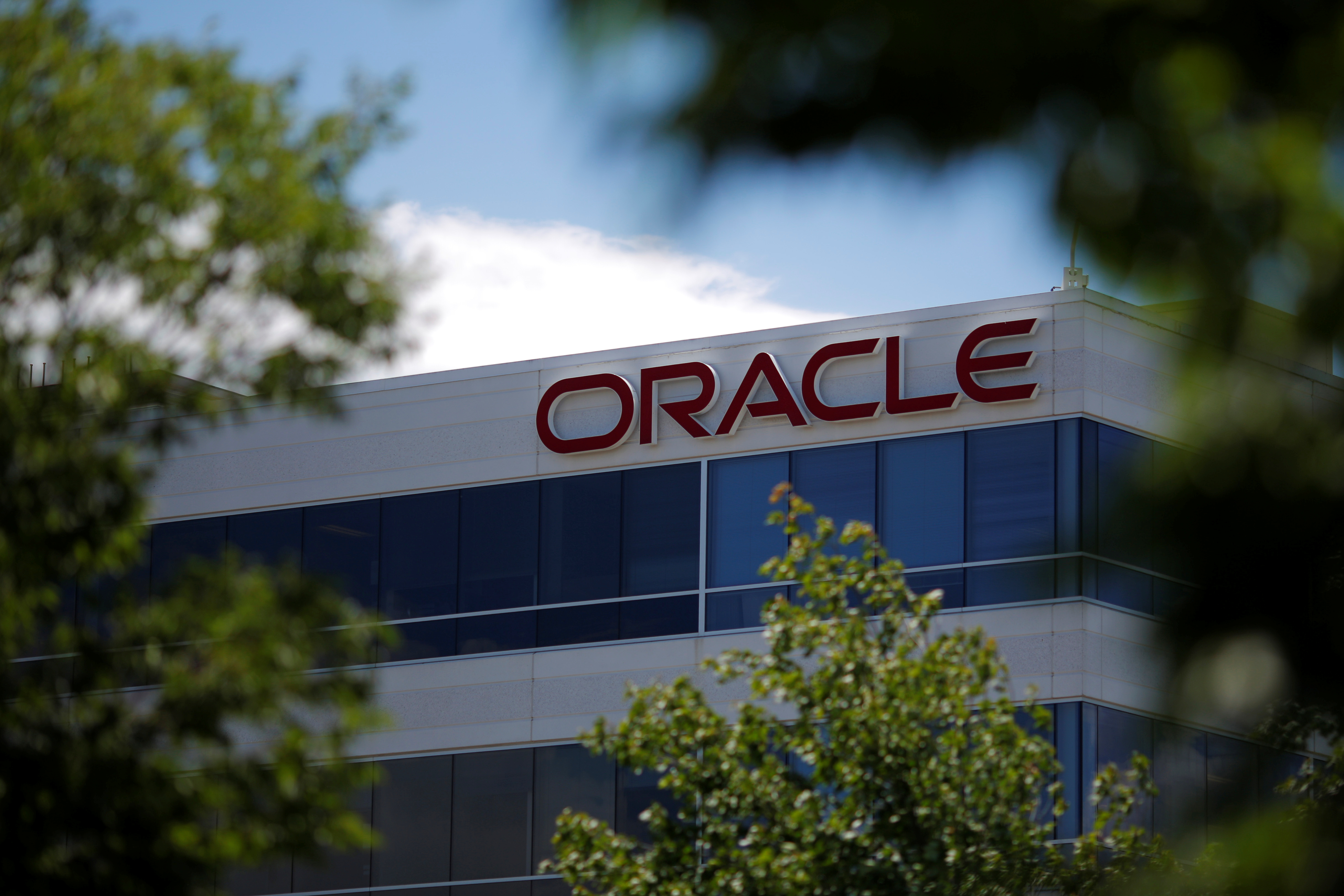 A sign marks a building housing Oracle offices in Burlington