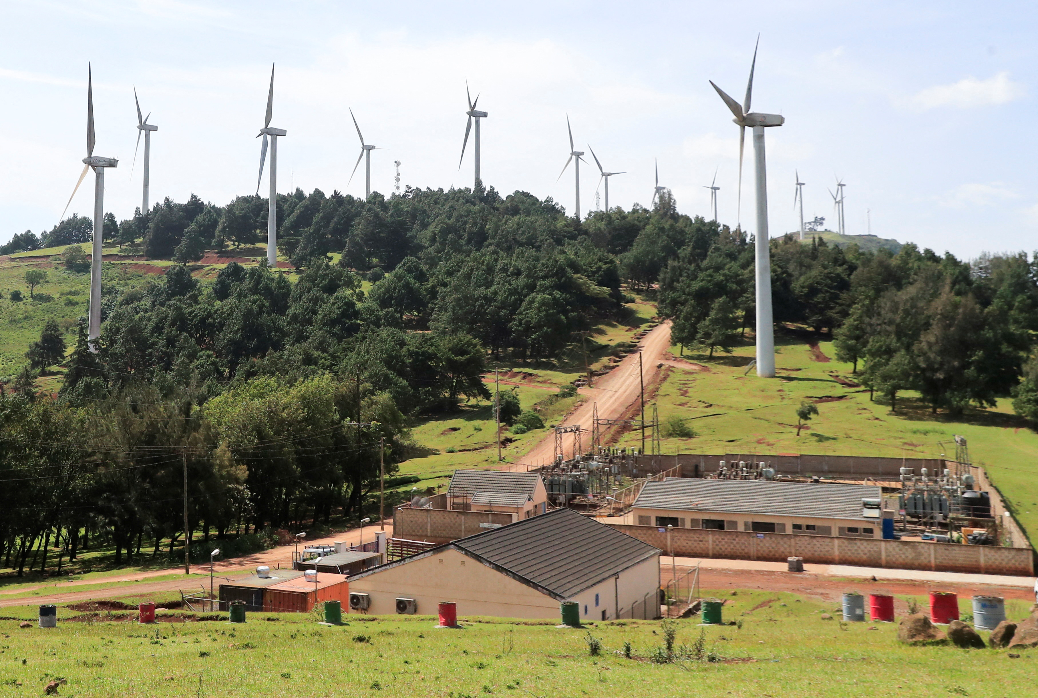 Power-generating wind turbines are seen at the KenGen station in Ngong hills