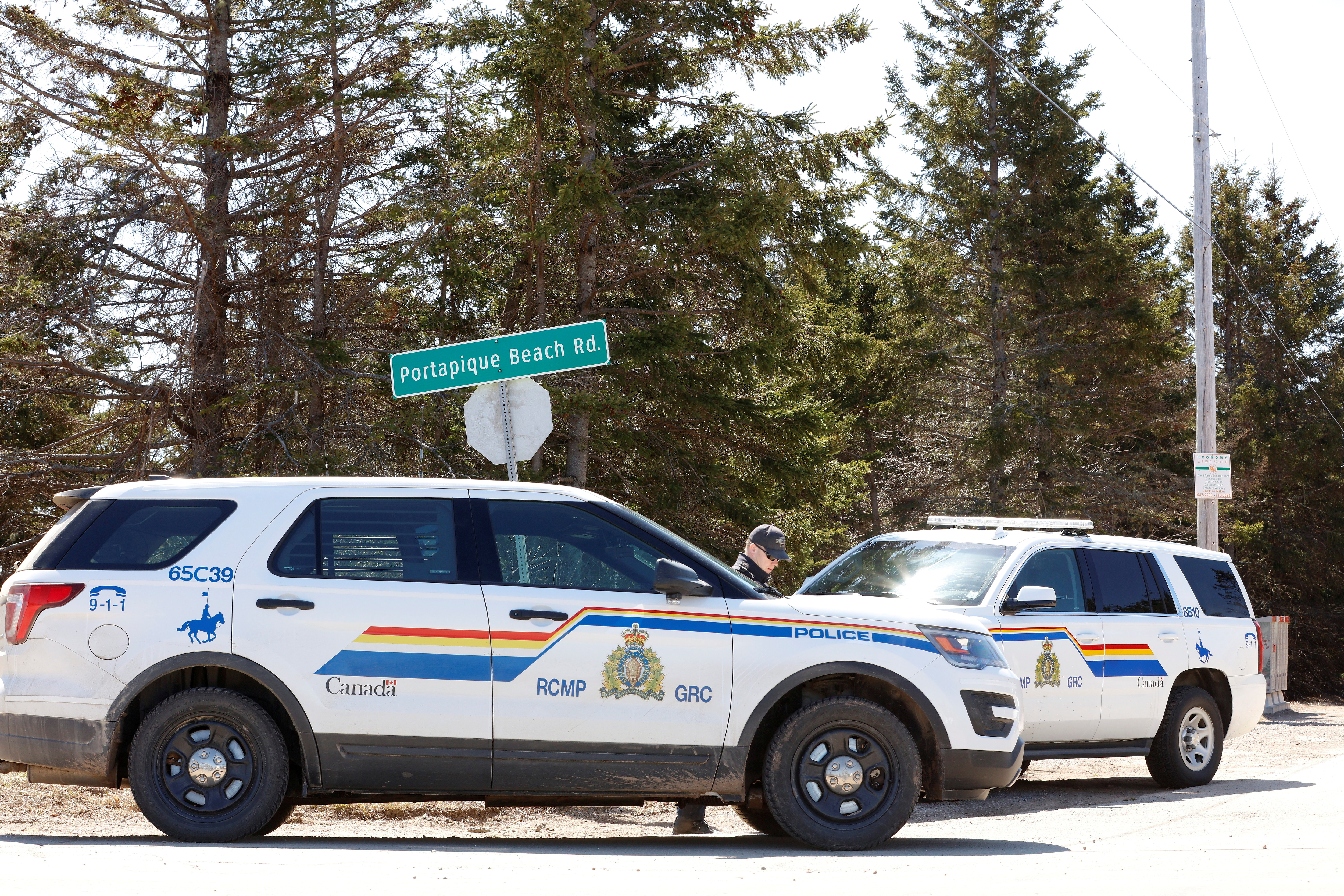 Royal Canadian Mounted Police (RCMP) block the entrance to Portapique Beach Road after they finished their search for Gabriel Wortman, who they describe as a shooter of multiple victims, in Portapique, Nova Scotia, Canada April 19, 2020. REUTERS/John Morris/File Photo