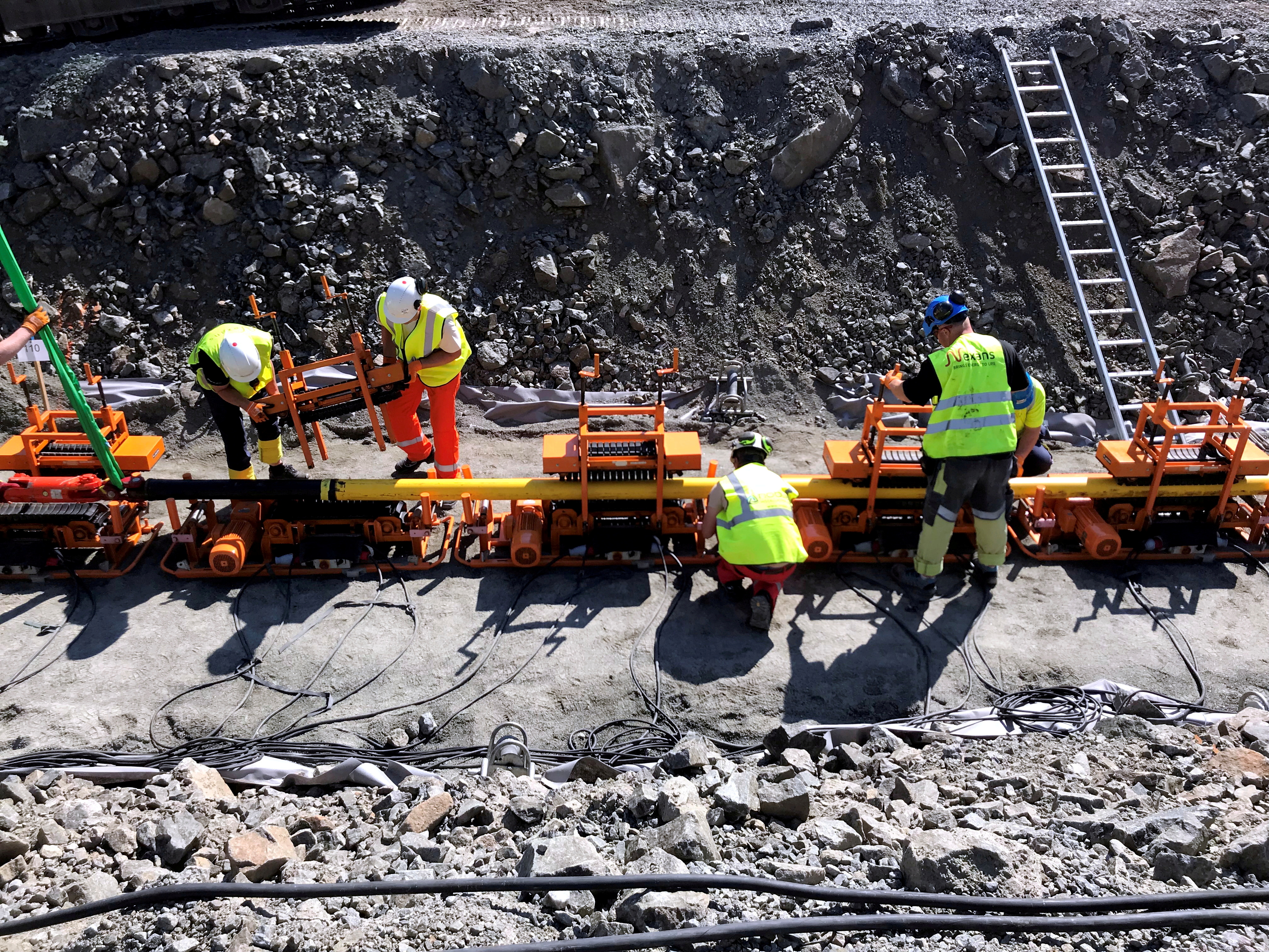 Workers lay a NordLink subsea interconnector power cable to connect Norway and Germany at the Vollesfjord fjord near Flekkefjord