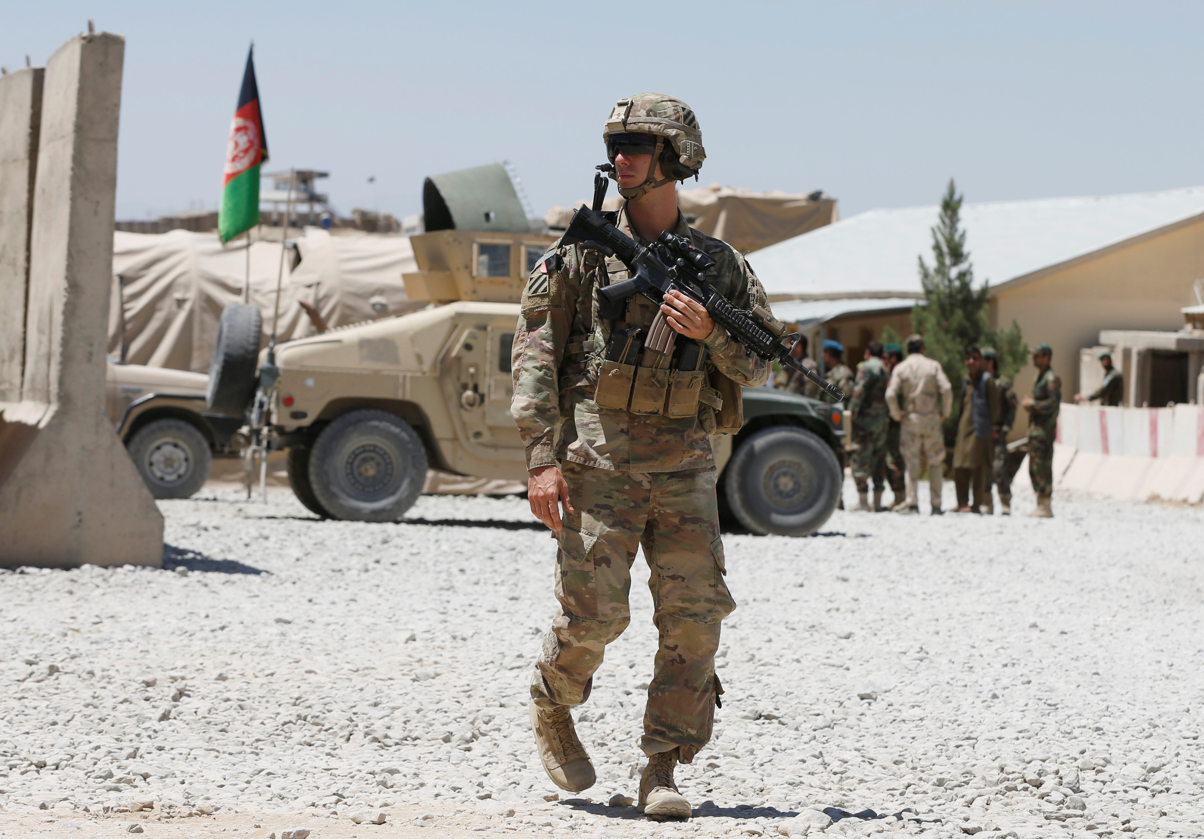 A U.S. soldier keeps watch at an Afghan National Army (ANA) base in Logar province, Afghanistan
