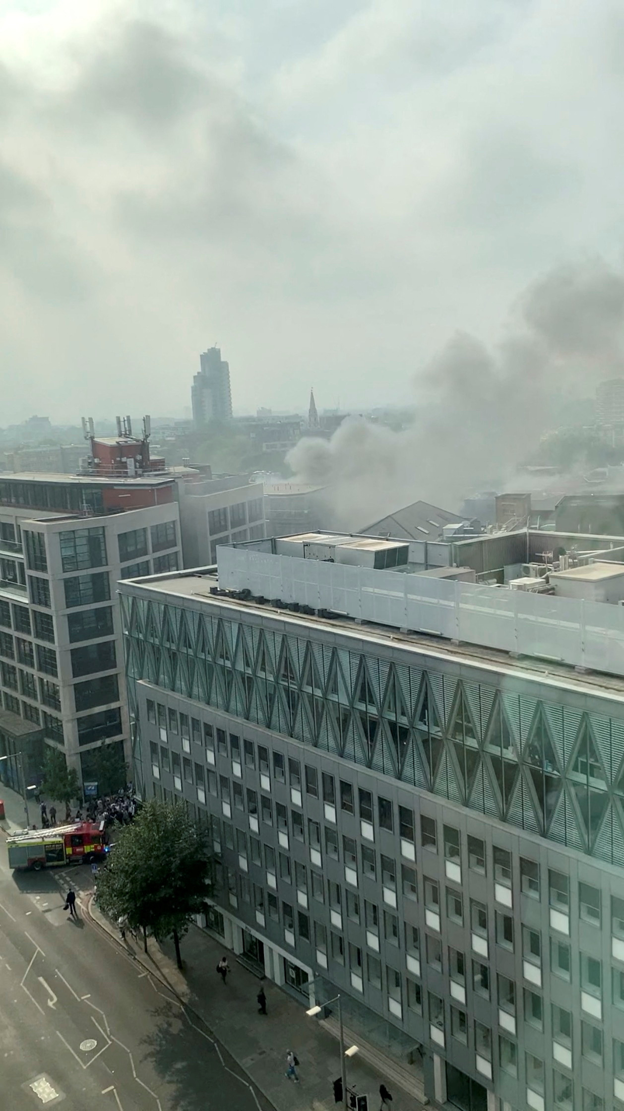 Smoke rises over the Union street after a fire broke out near the London Bridge