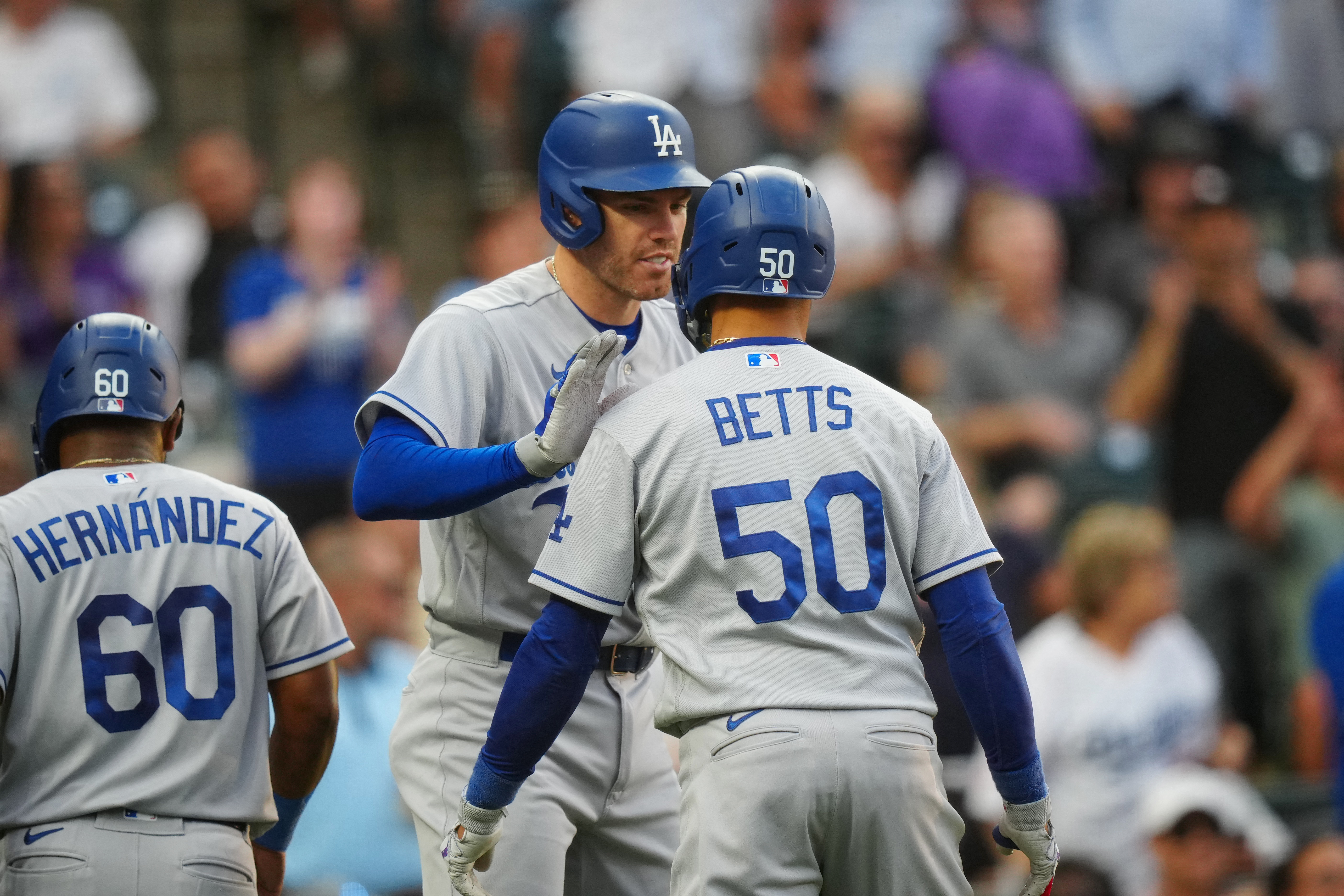 Rockies use clutch hitting to down Dodgers