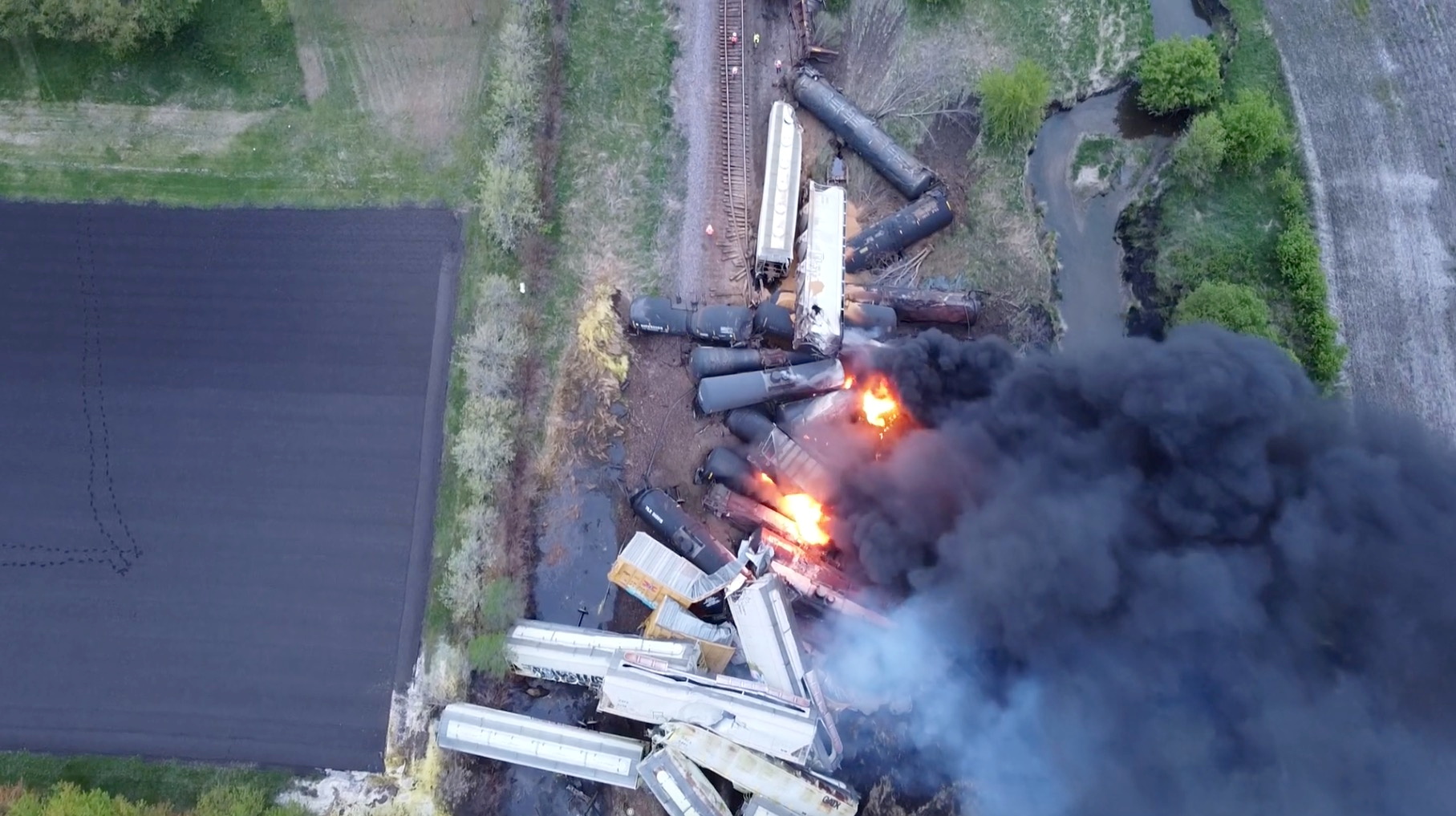 Fire is seen on a Union Pacific train carrying hazardous material that has derailed in Sibley, Iowa, U.S., in this still frame obtained from social media drone video dated May 16, 2021. NATHAN MINTEN/via REUTERS  