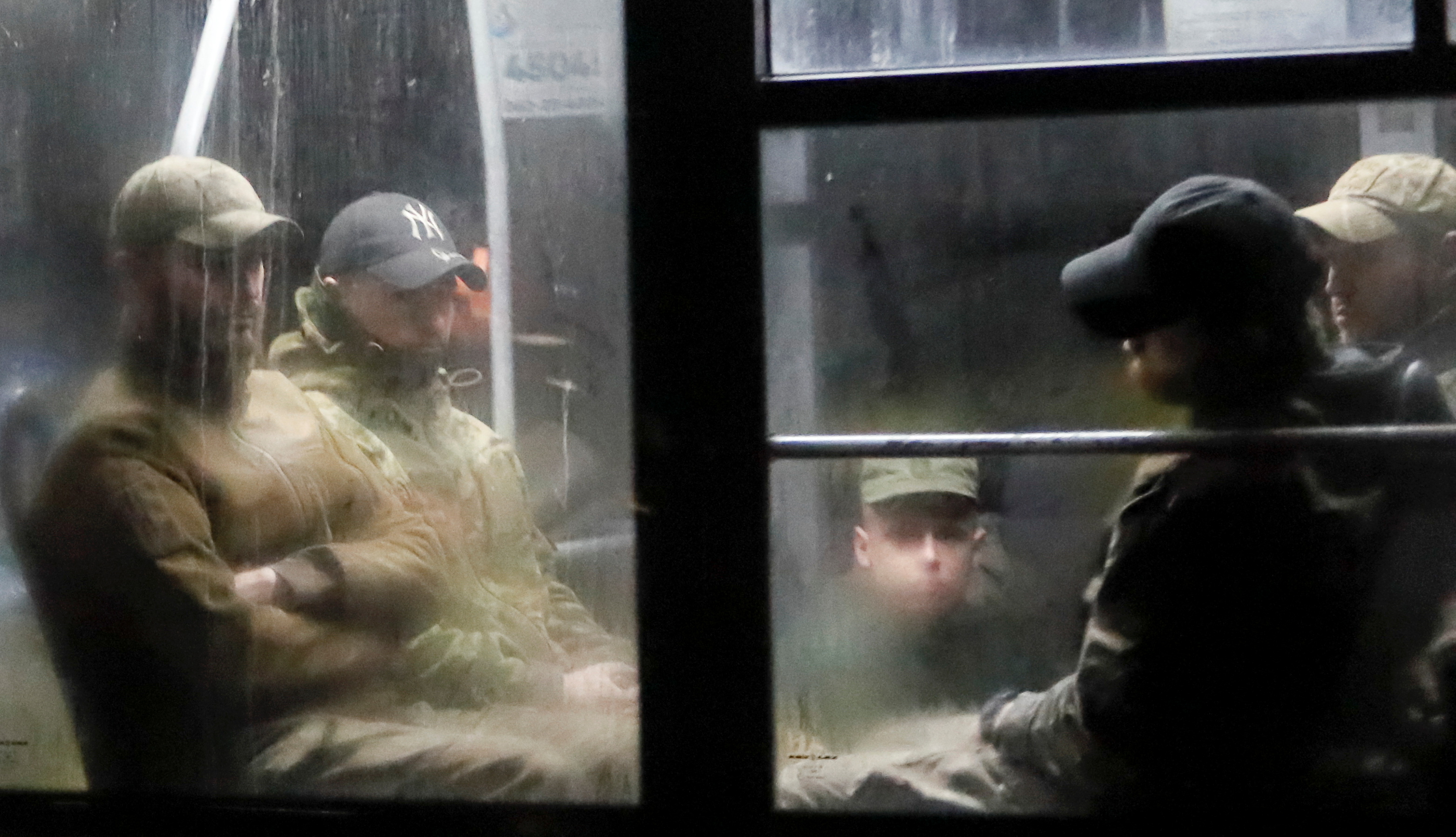 Buses carrying Ukrainian Azovstal service members leave Mariupol