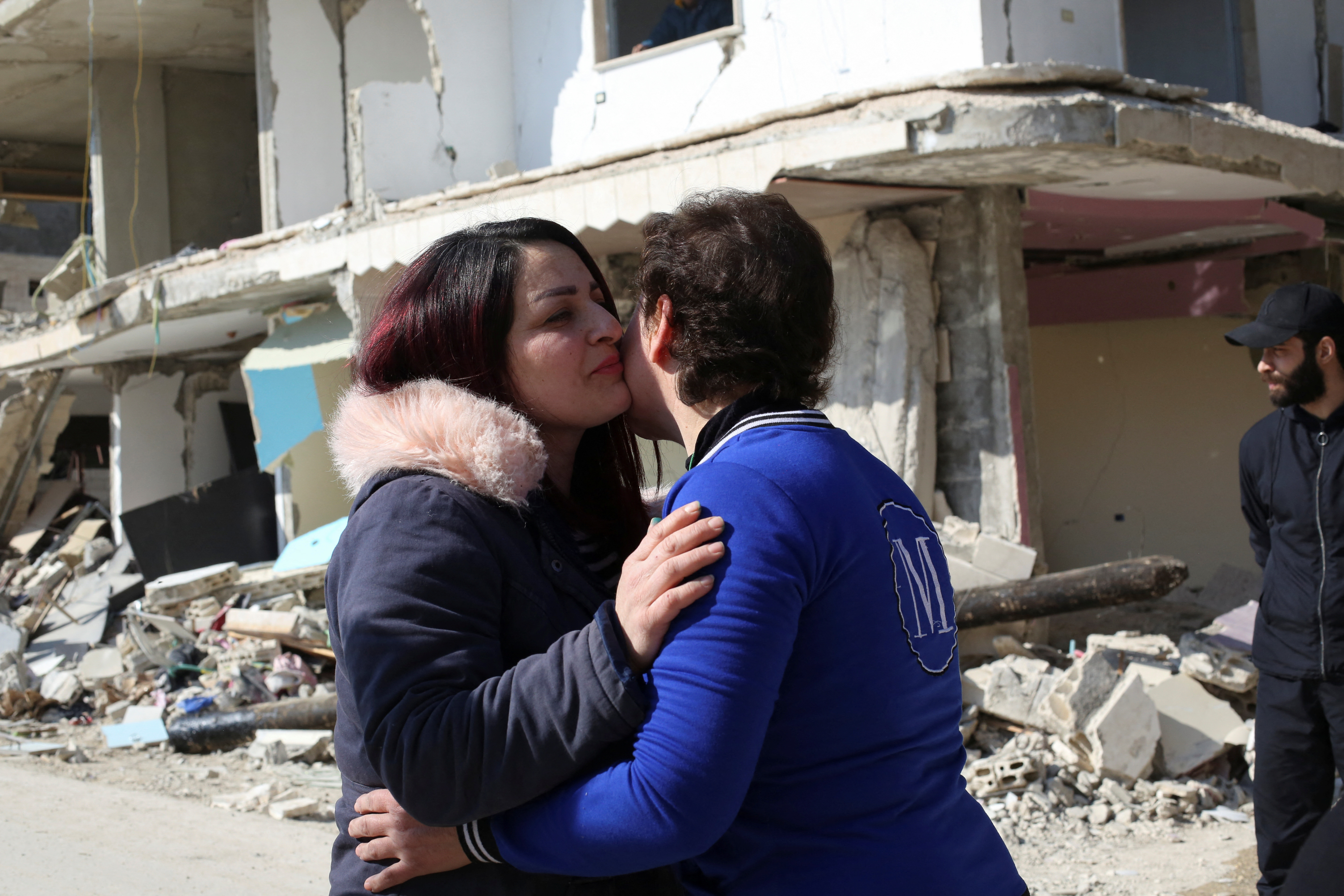 Syrian mother rescues children and a bag of memories from deadly quake