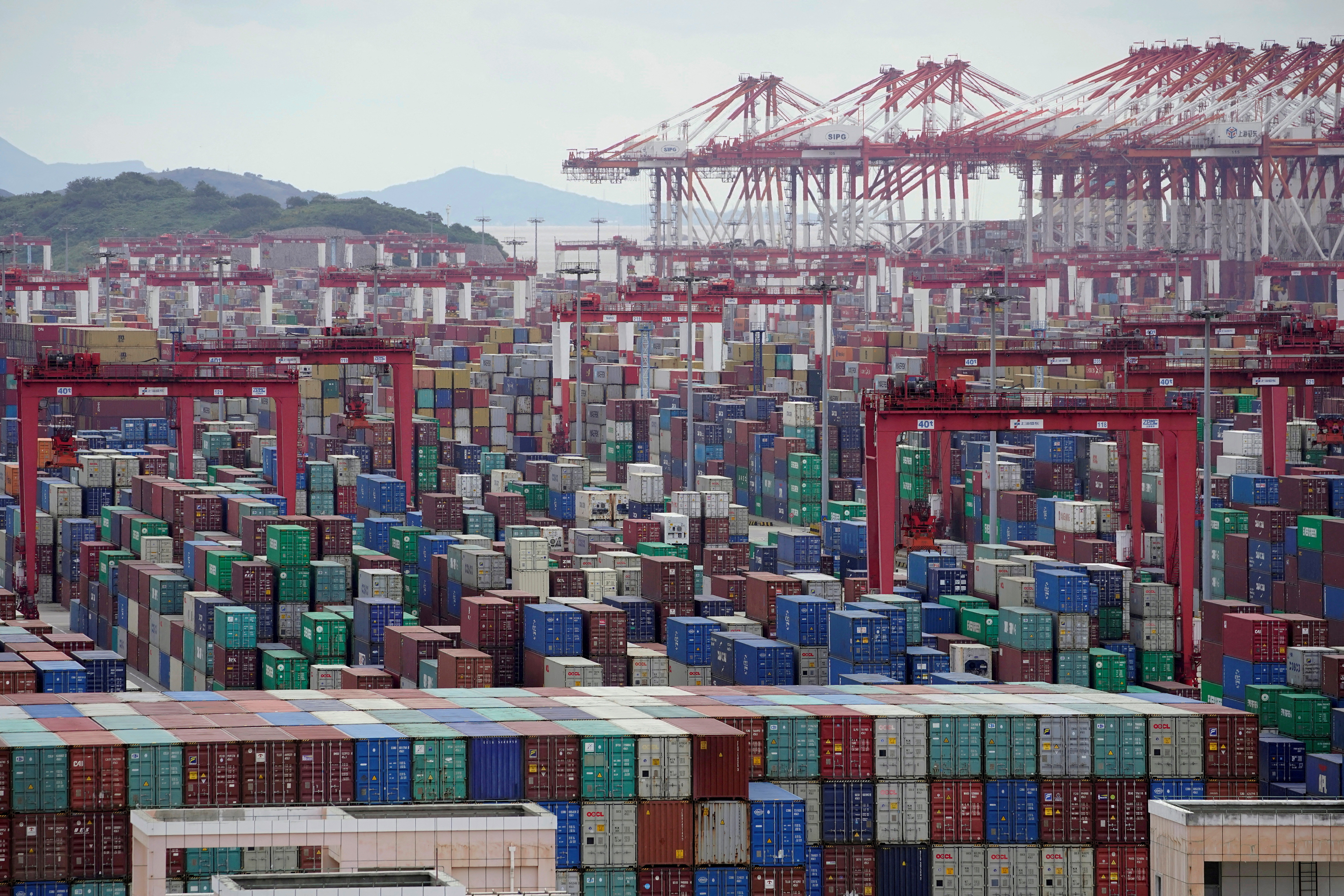 Containers are seen at the Yangshan deep water port in Shanghai