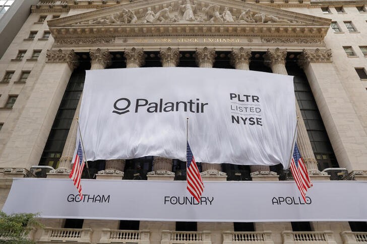A banner featuring the logo of Palantir Technologies (PLTR) is raised at the New York Stock Exchange (NYSE) on the day of their initial public offering (IPO) in Manhattan, New York City