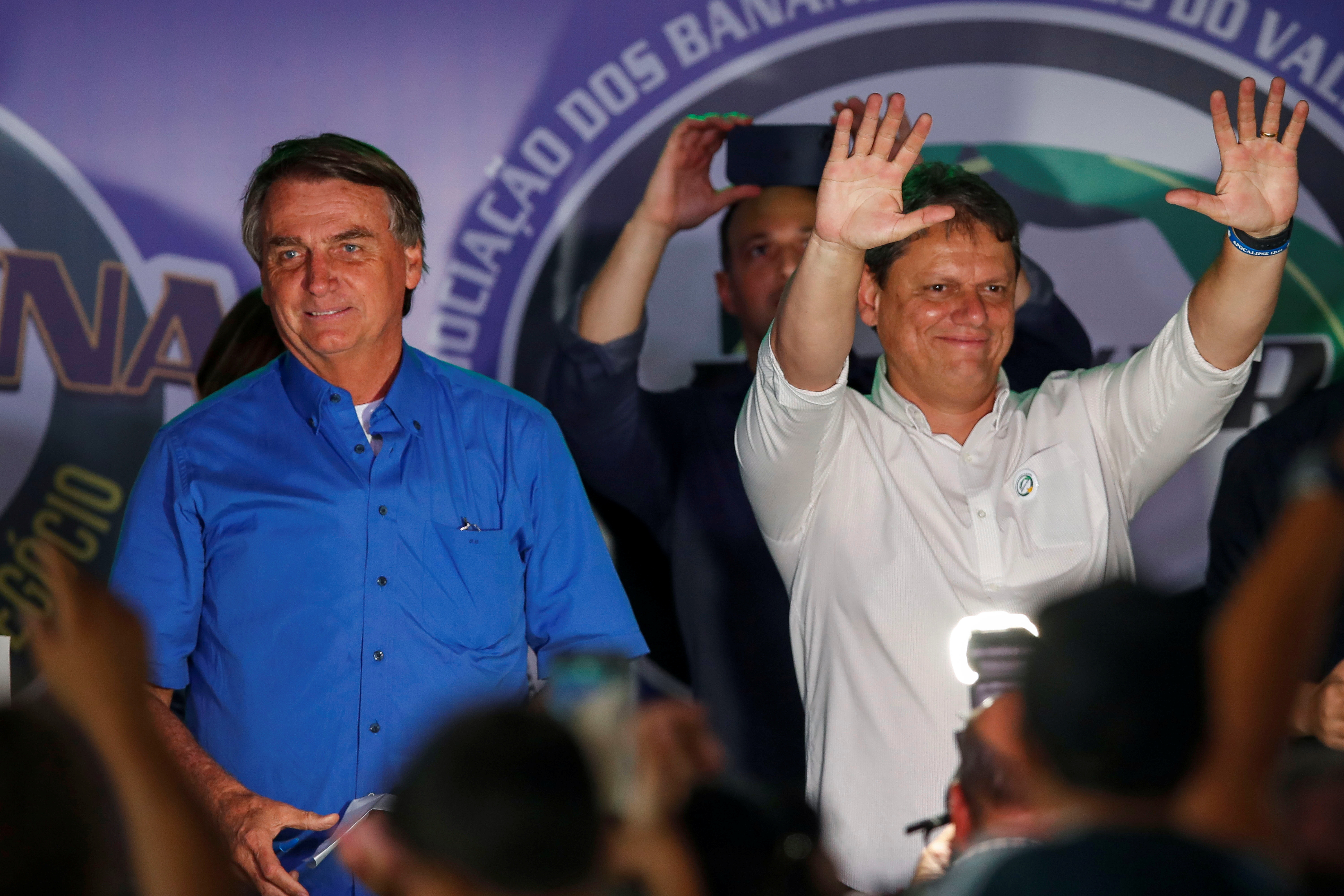 FILE PHOTO - Brazil's President Jair Bolsonaro takes part of a farmer's fair of banana producers in Pariquera-Acu