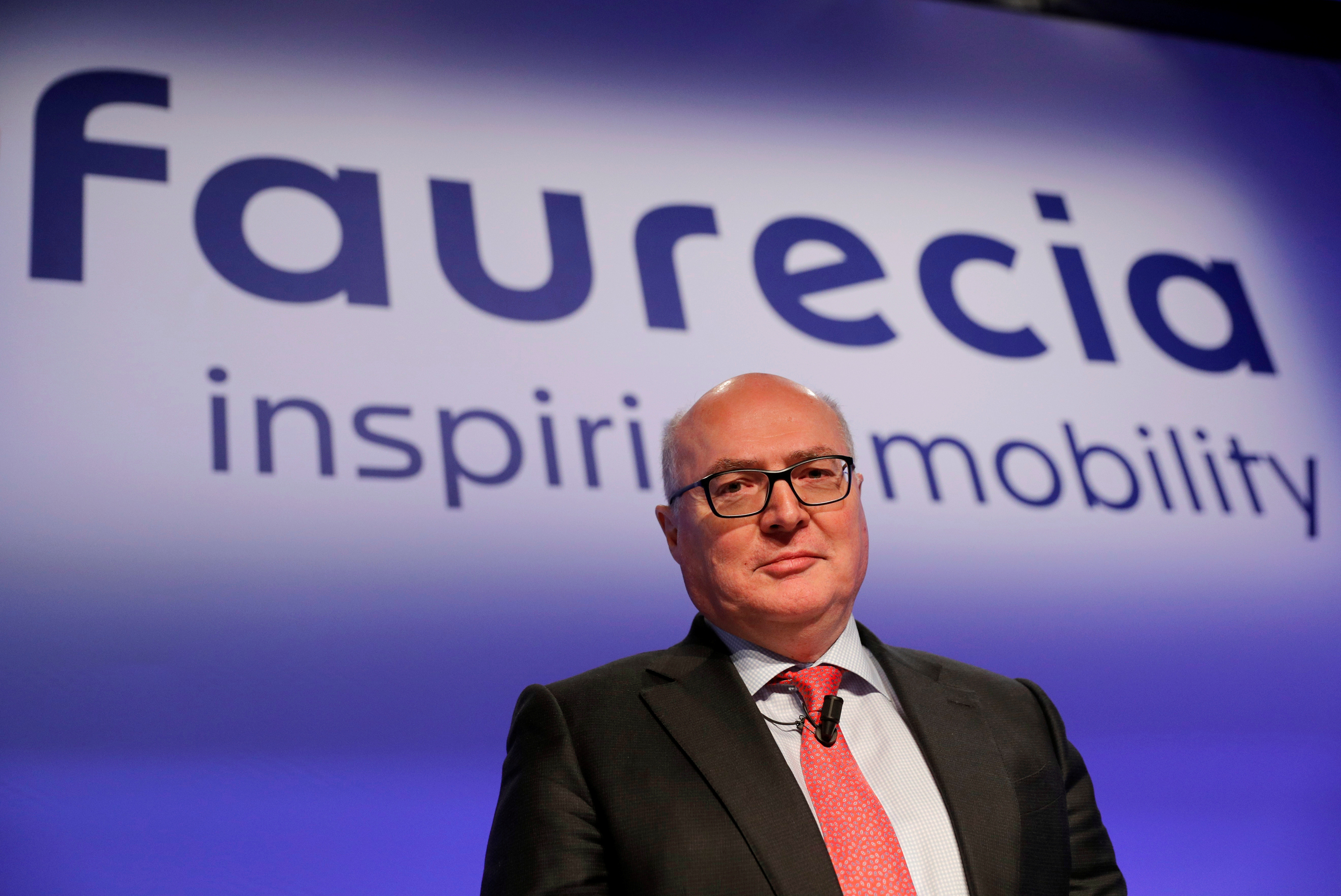 Patrick Koller, CEO of French car parts supplier Faurecia, poses before the company's 2016 annual results presentation in Paris