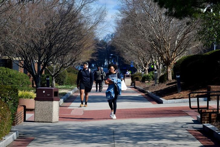 Students walk between classes at North Carolina A&T University along the line that divides Congressional Districts 13 and 6 on campus in Greensboro