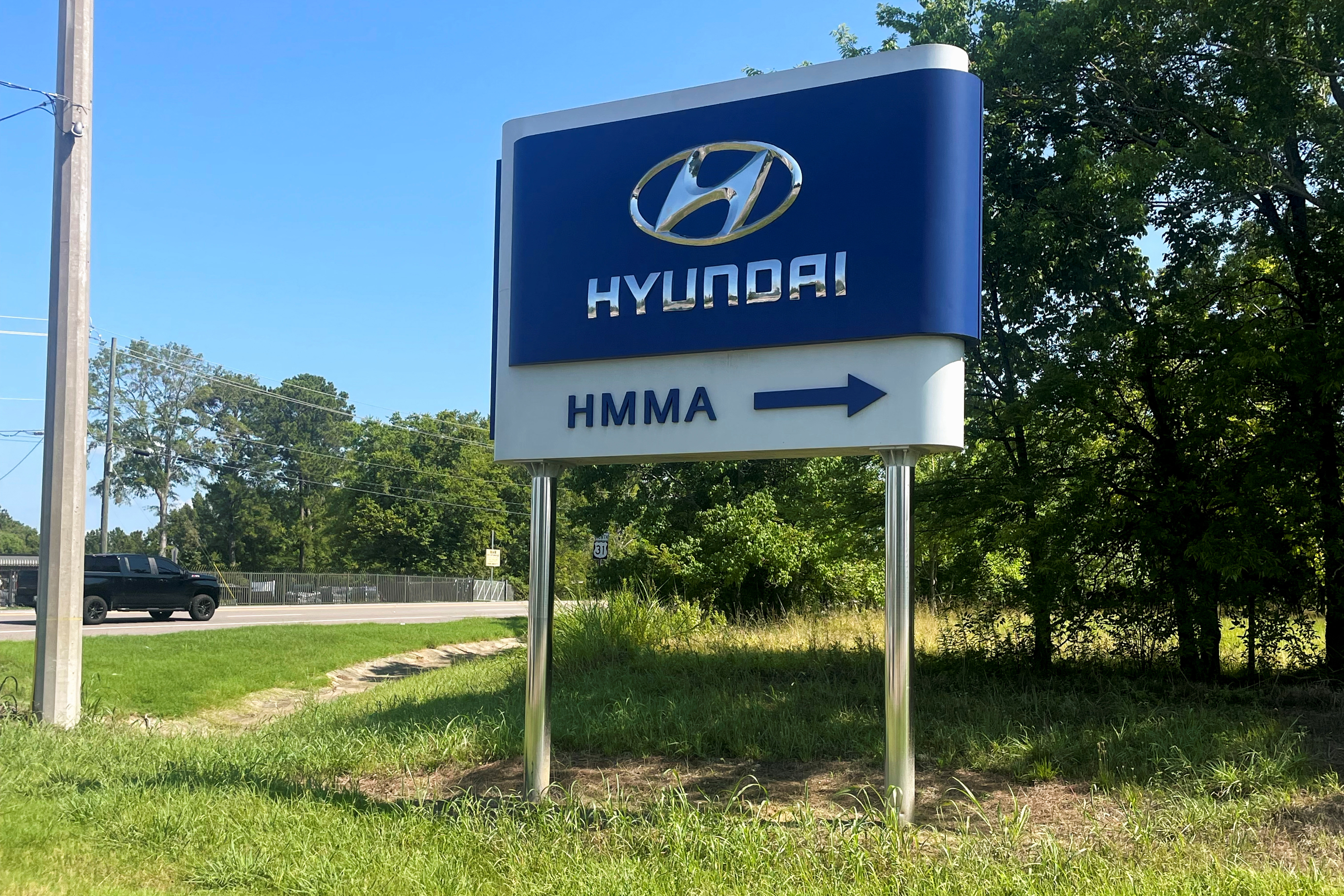 A sign shows directions to the Hyundai Motor Manufacturing Alabama automobile plant in Montgomery