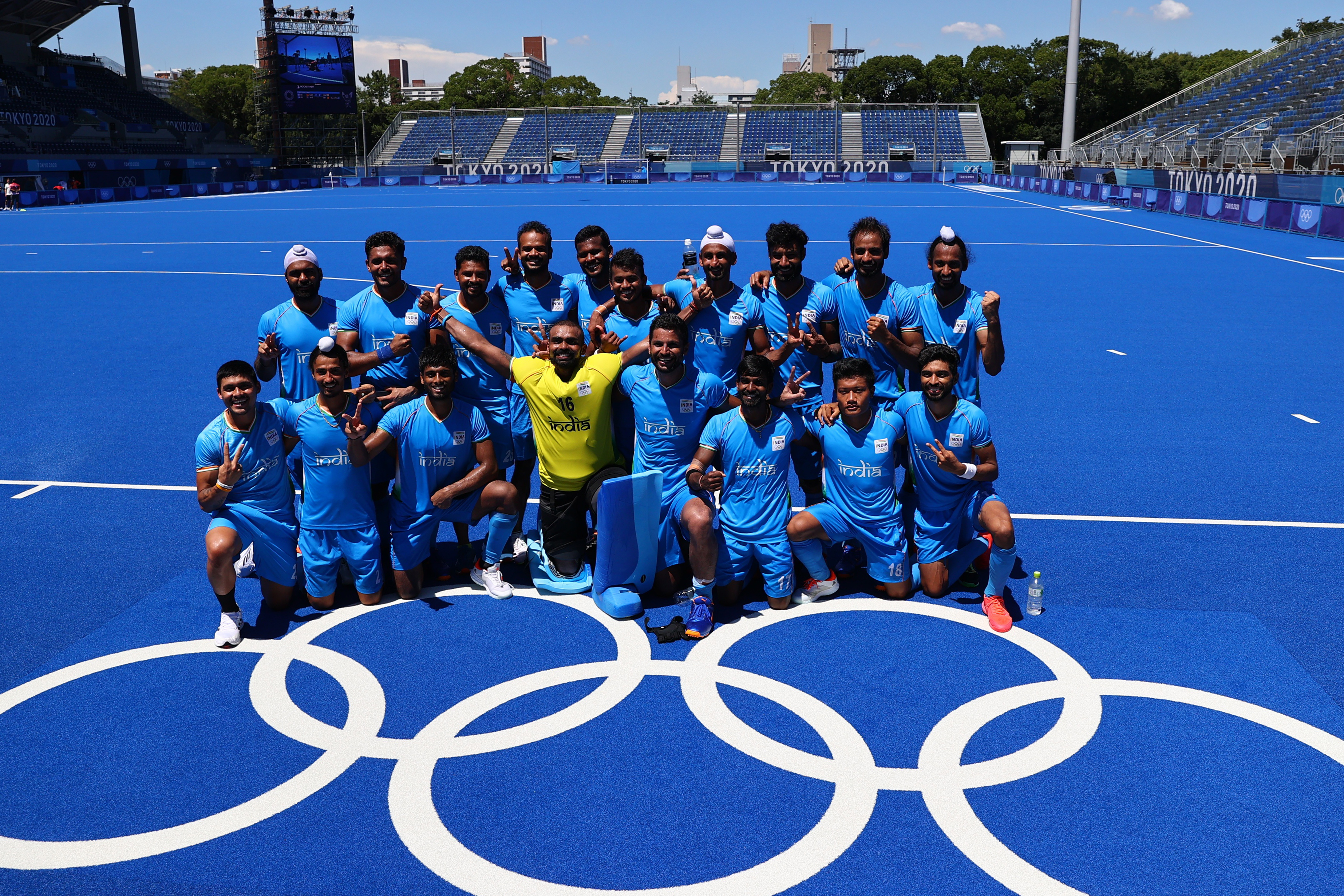 Tokyo 2020 Olympics - Hockey - Men - Bronze medal match - Germany v India - Oi Hockey Stadium, Tokyo, Japan - August 5, 2021. Players of India pose for a group photo after winning the match for bronze. REUTERS/Bernadett Szabo