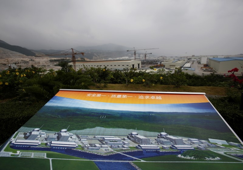 An artist impression of Taishan Nuclear Power Plant is displayed on a viewing platform overlooking the construction site in Taishan, China