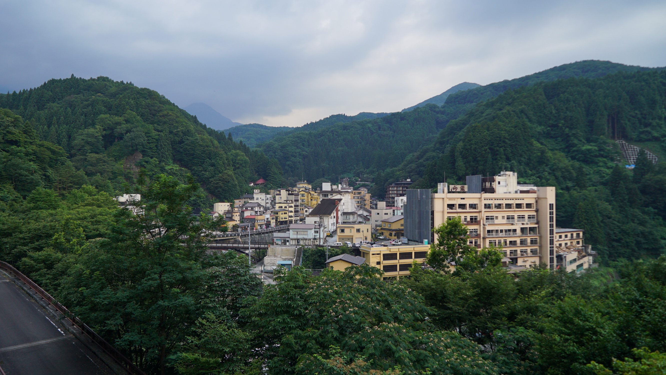 The town of Tsuchiyu Onsen Machi is seen embedded among the mountains
