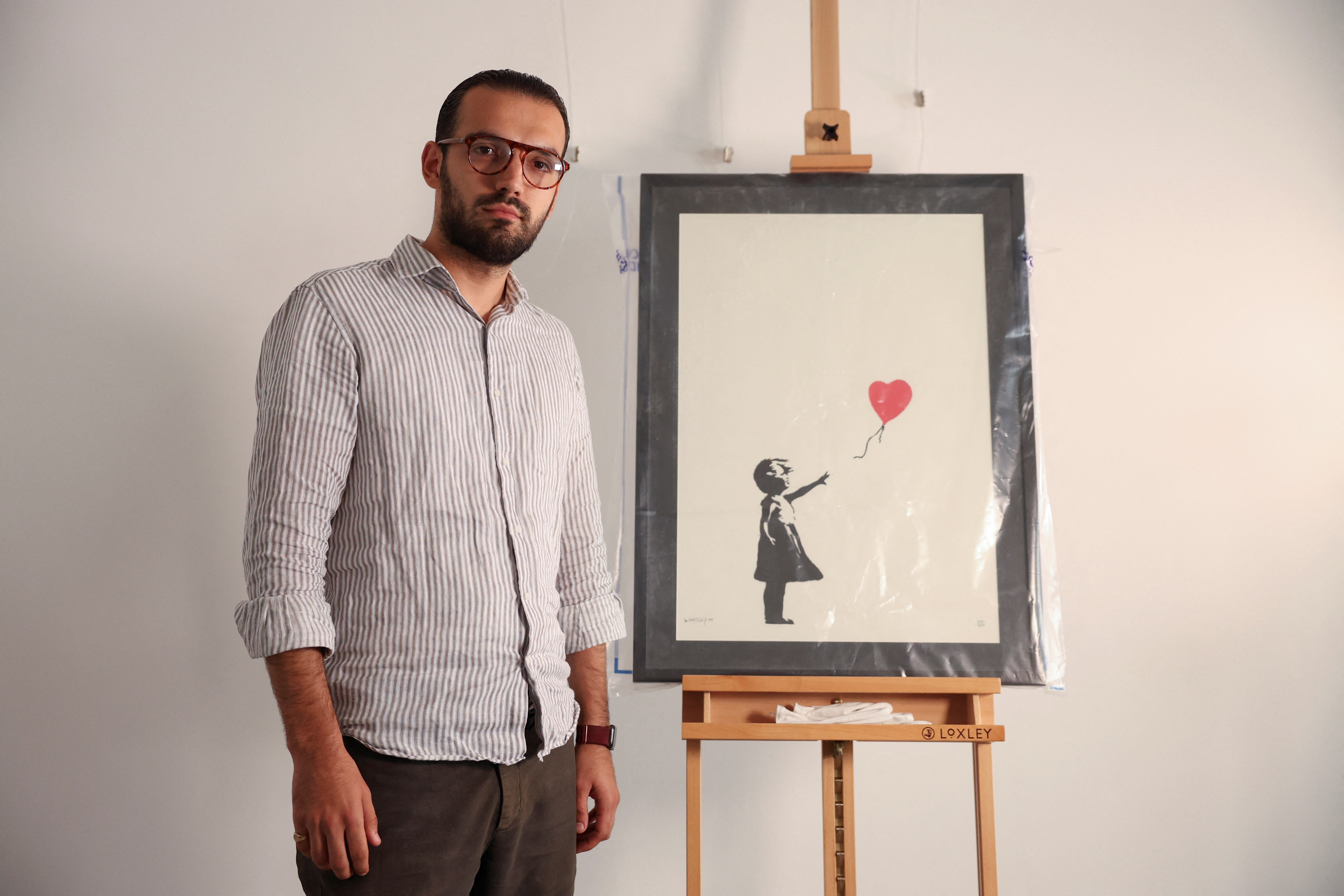 Stolen Banksy 'Girl with Balloon' painting found | Reuters