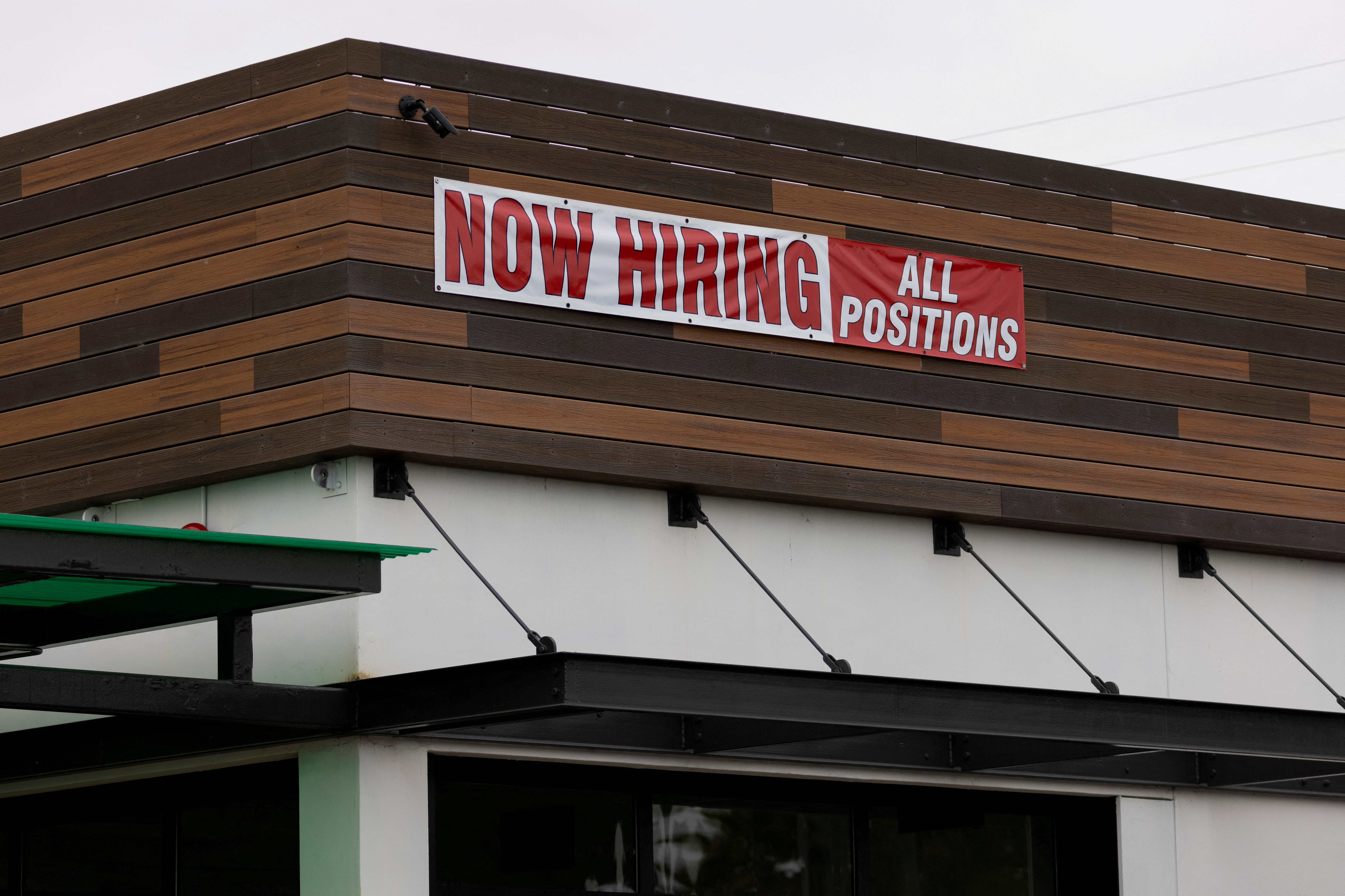 A restaurant advertising jobs looks to attract workers in Oceanside, California