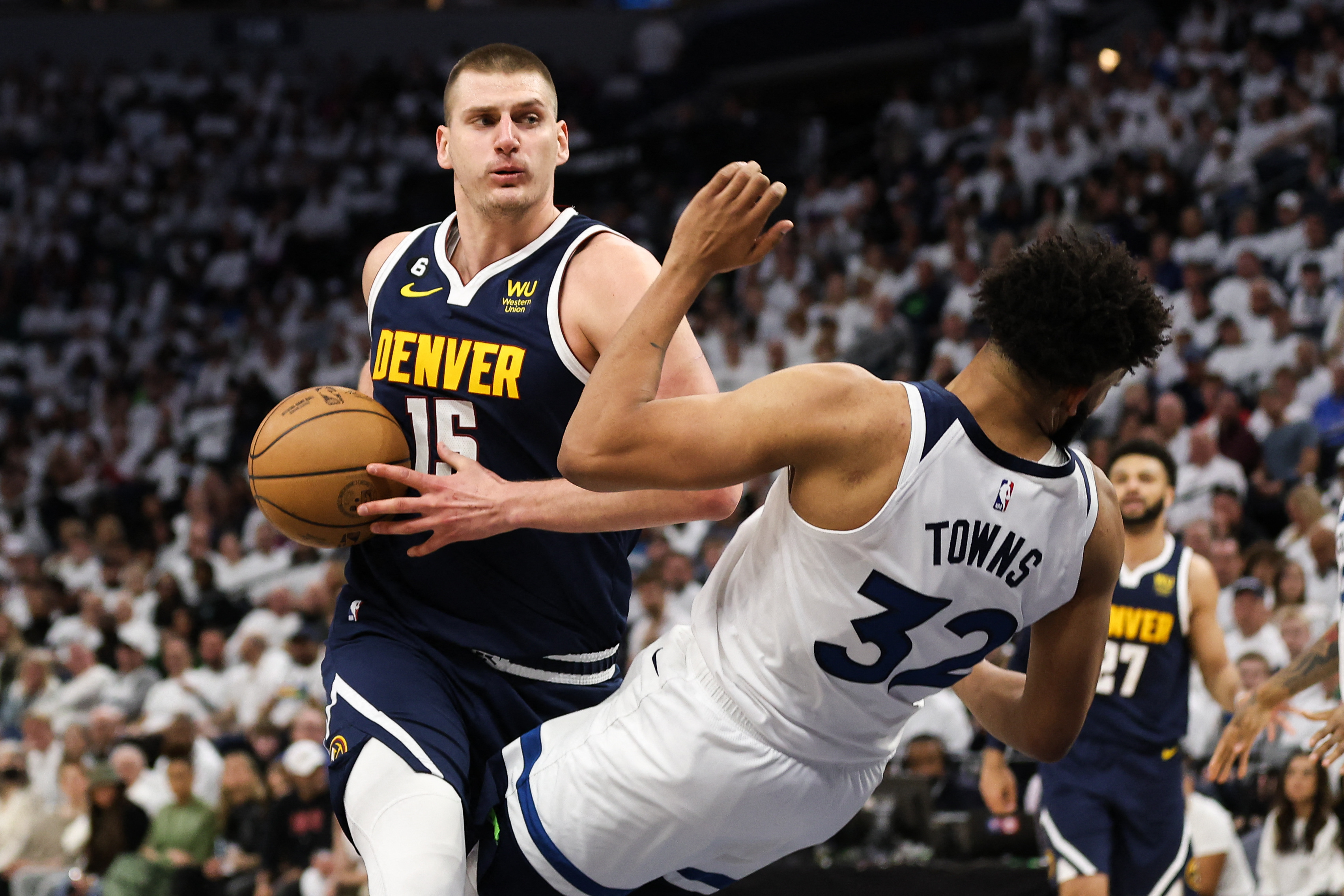 Wolves hold off Nuggets in OT, survive another day | Reuters