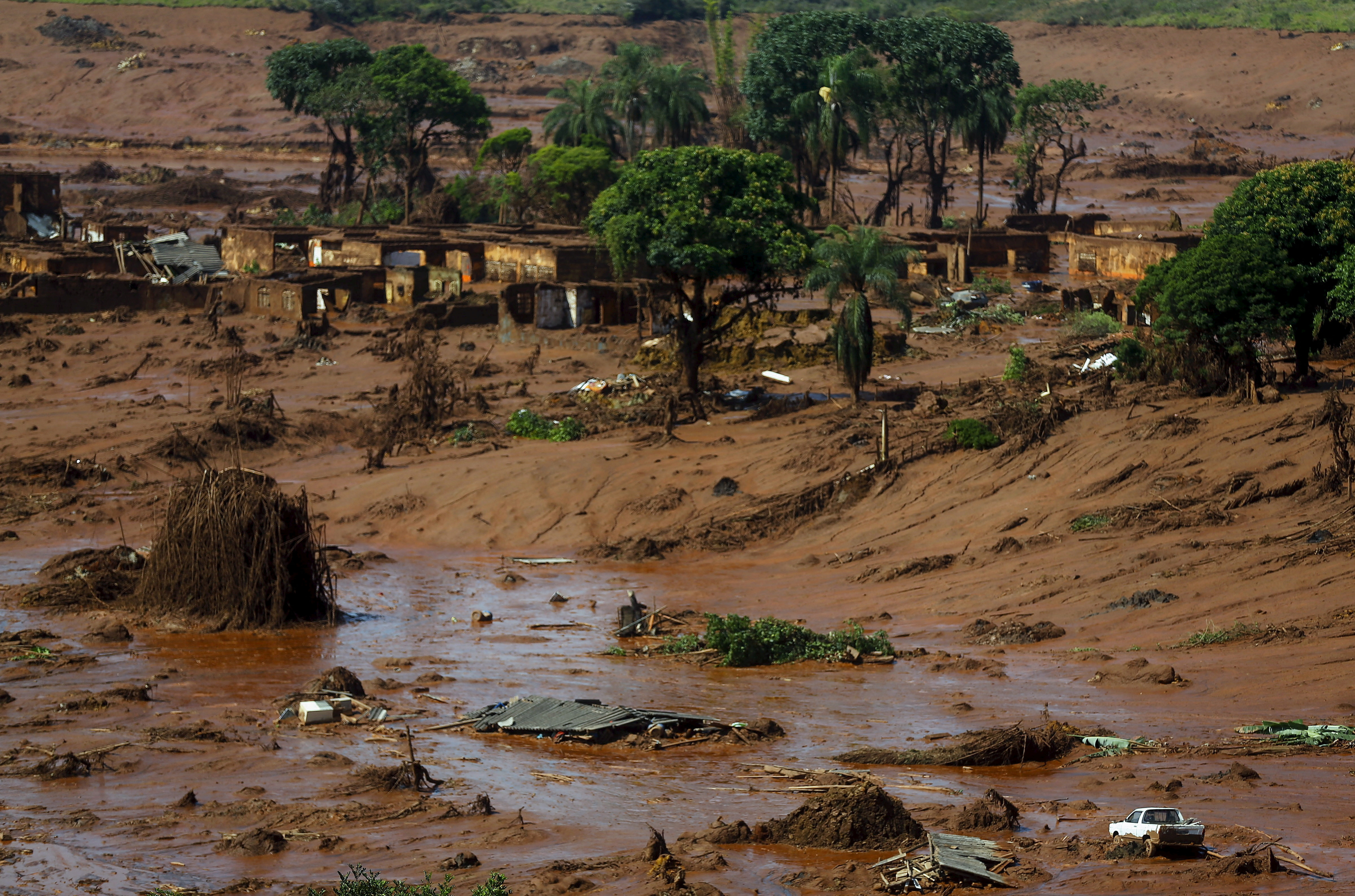 The Bento Rodrigues district is pictured covered with mud after a dam owned by Vale SA and BHP Billiton Ltd burst in Mariana