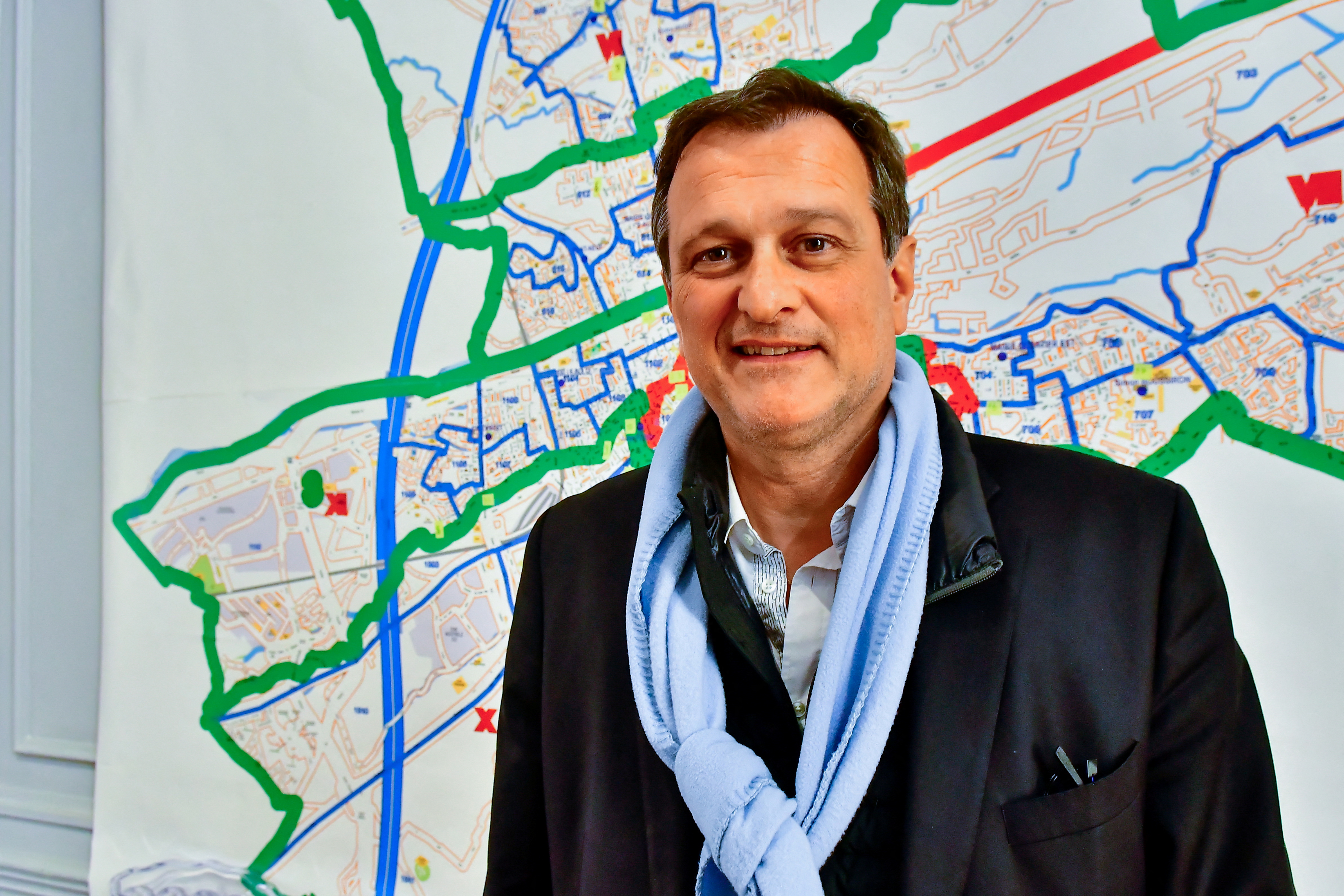 Louis Aliot, French far-right National Rally party candidate for the upcoming mayoral election, poses in Perpignan