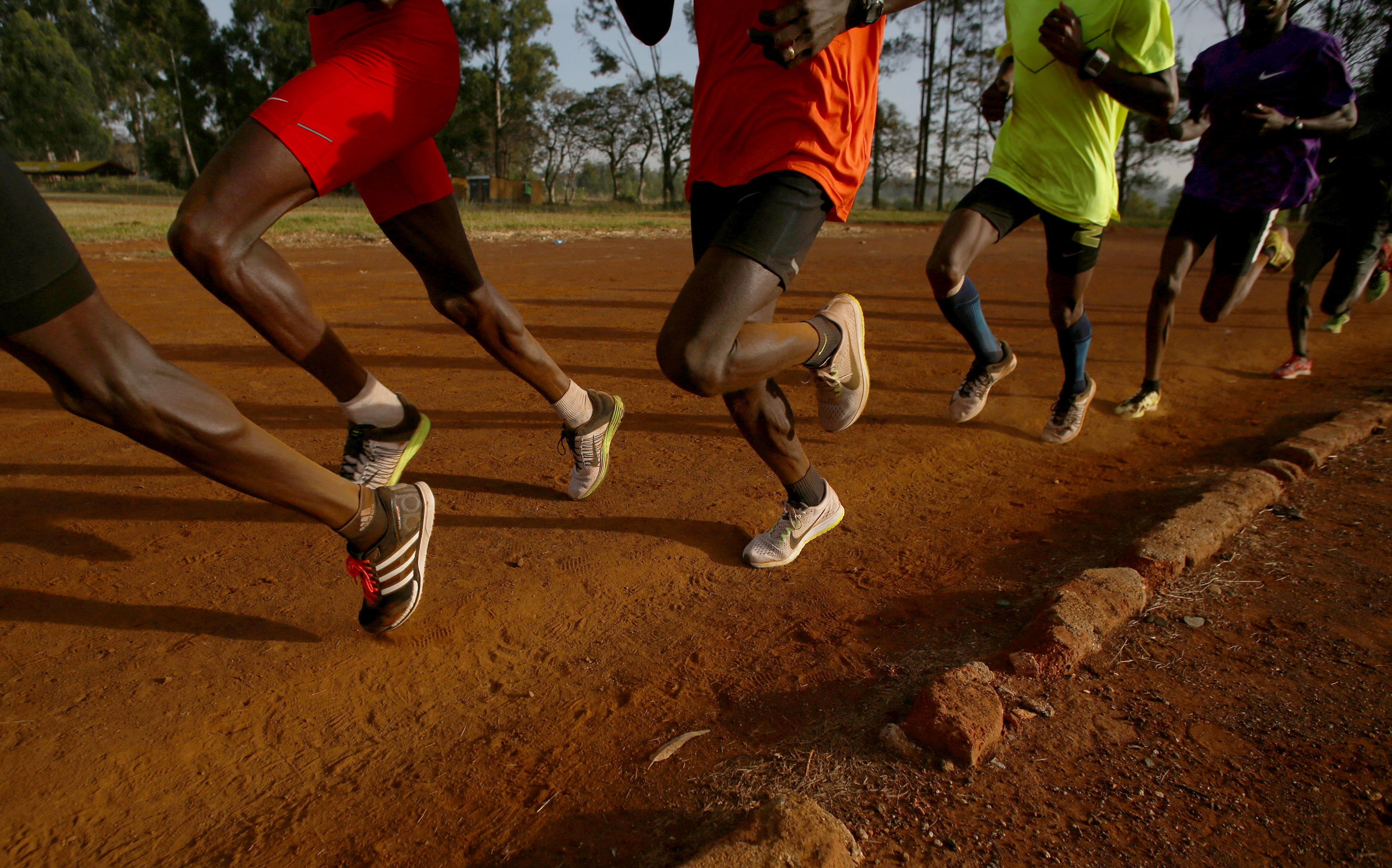 Athletes exercise in the early morning in the sports ground of the University of Eldoret in western Kenya