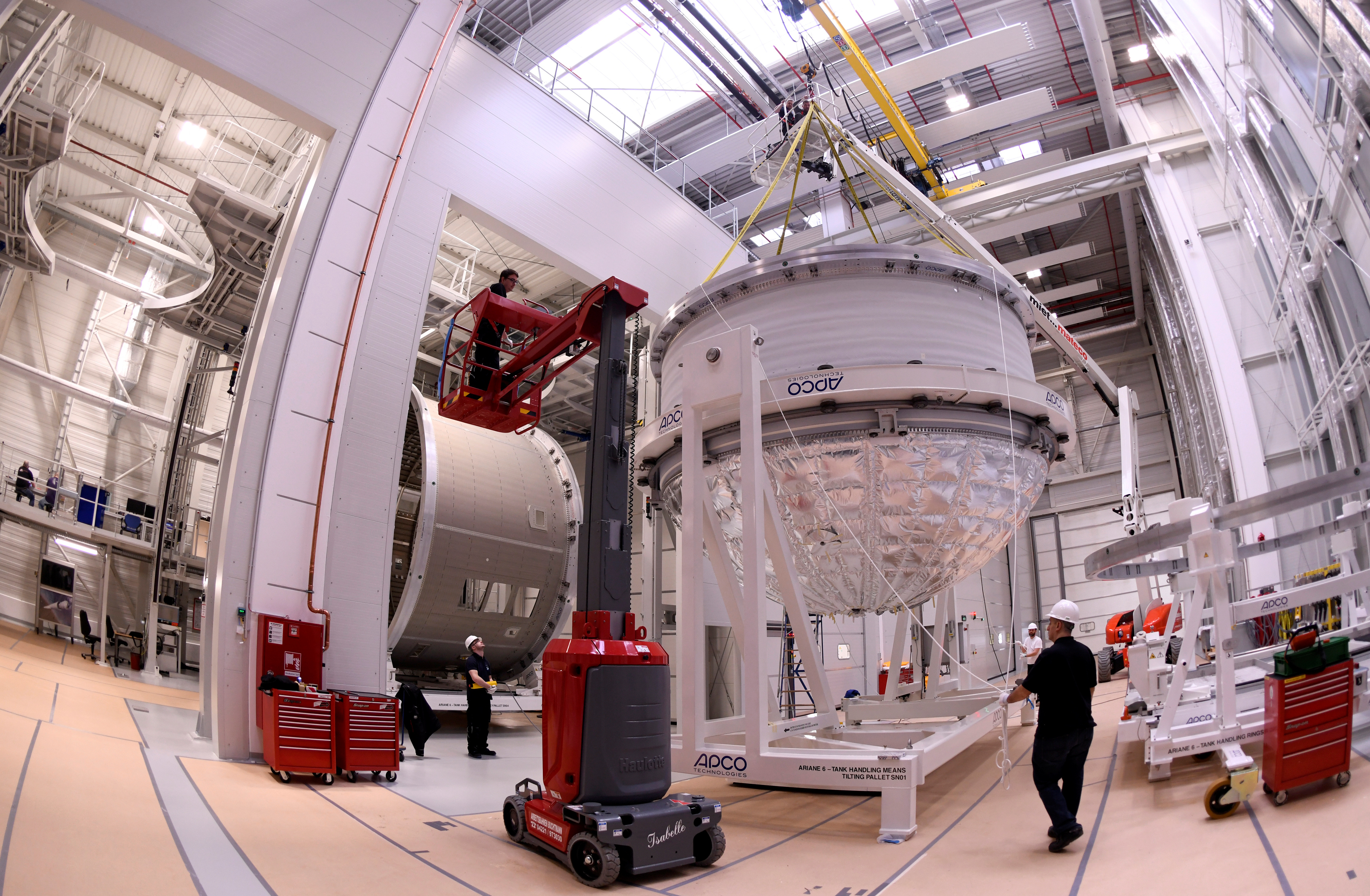 Employees of Ariane Group work in a production line of Ariane 6, Europe's next-generation space rocket, in Bremen