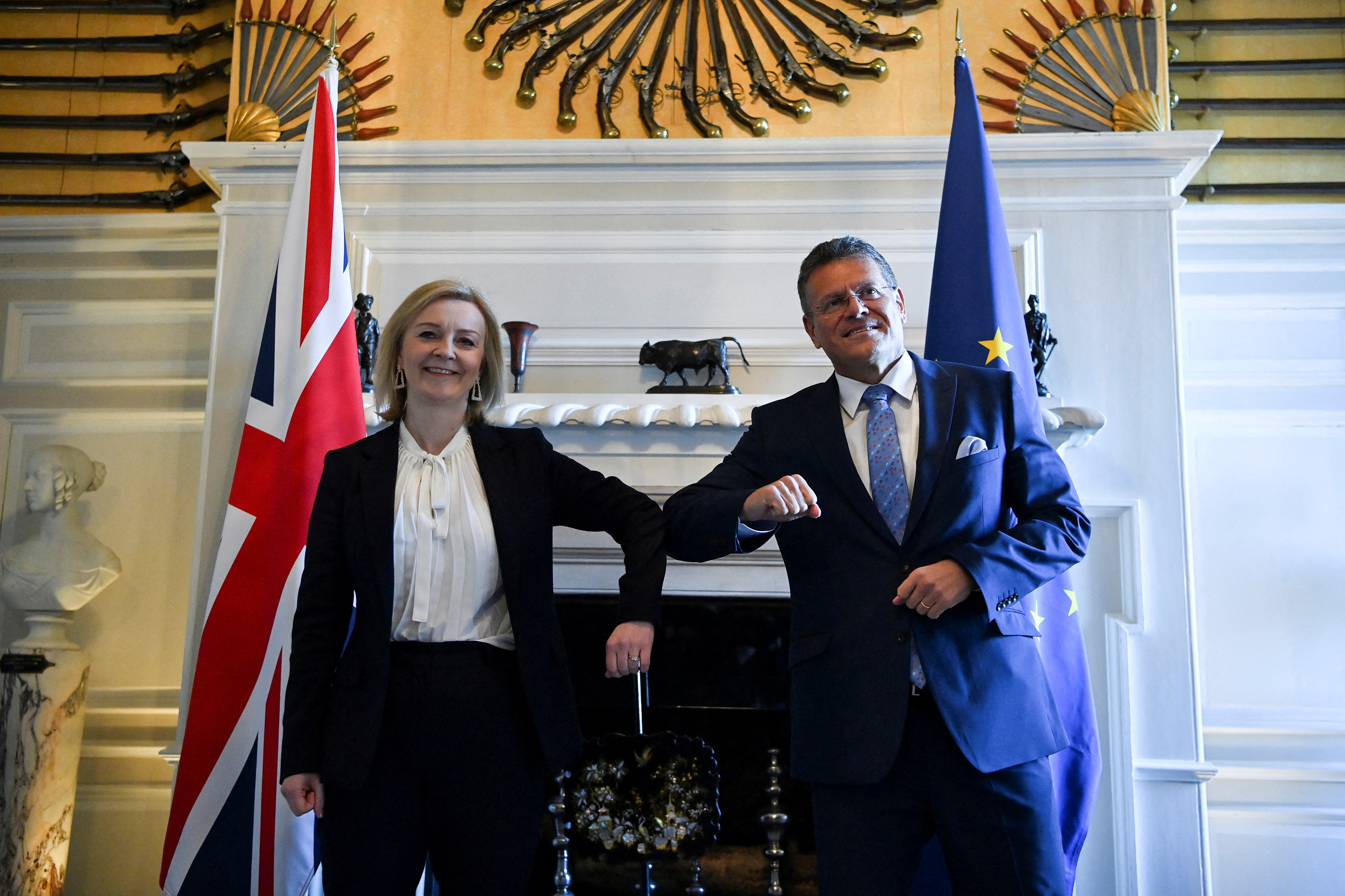 British Foreign Secretary Liz Truss bumps elbows with European Commission Vice-President Maros Sefcovic during a meeting at Chevening House in Sevenoaks, south of London, Britain January 13, 2022. Ben Stansall/Pool via REUTERS