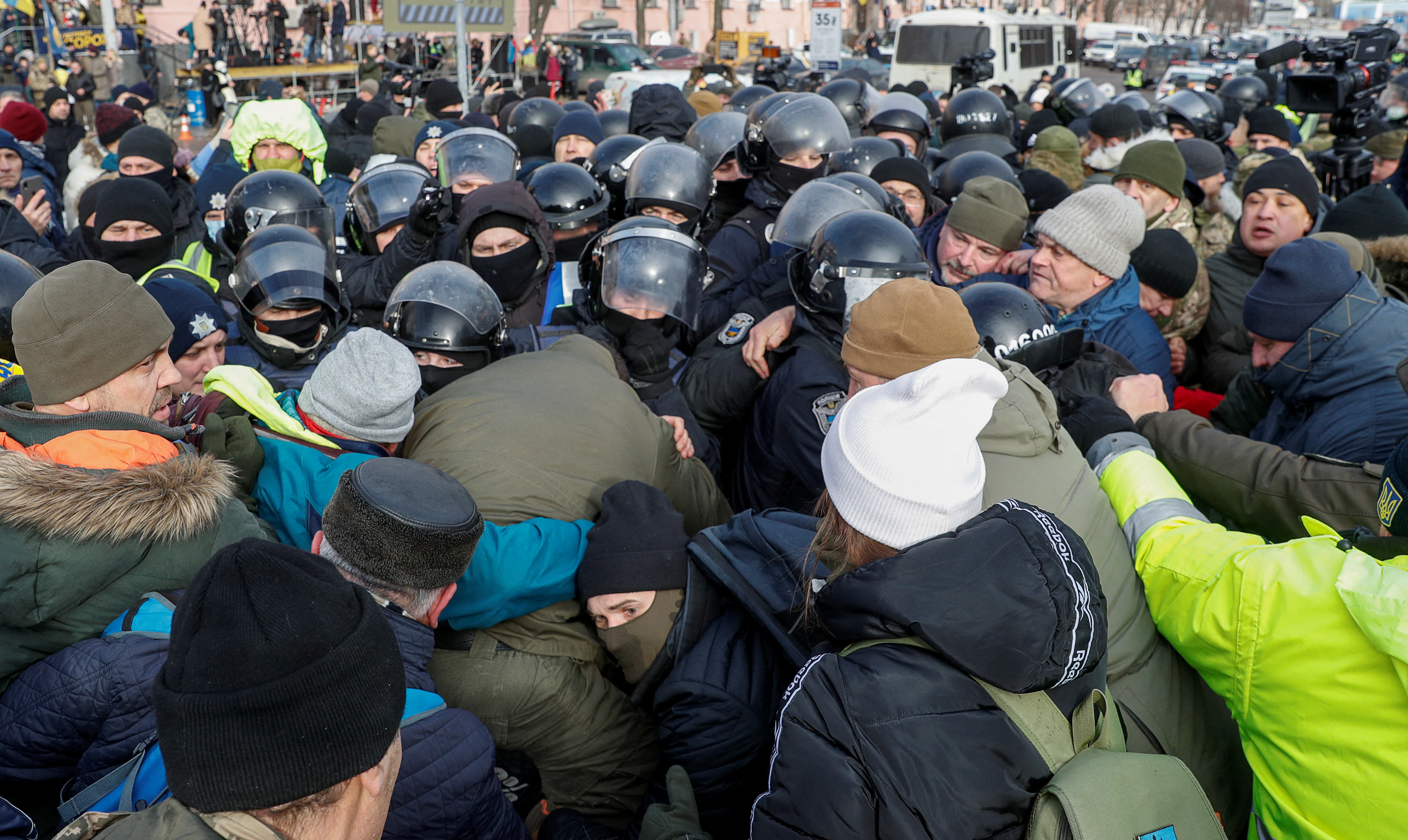 Supporters of Ukrainian former President Poroshenko gather near a court building in Kyiv