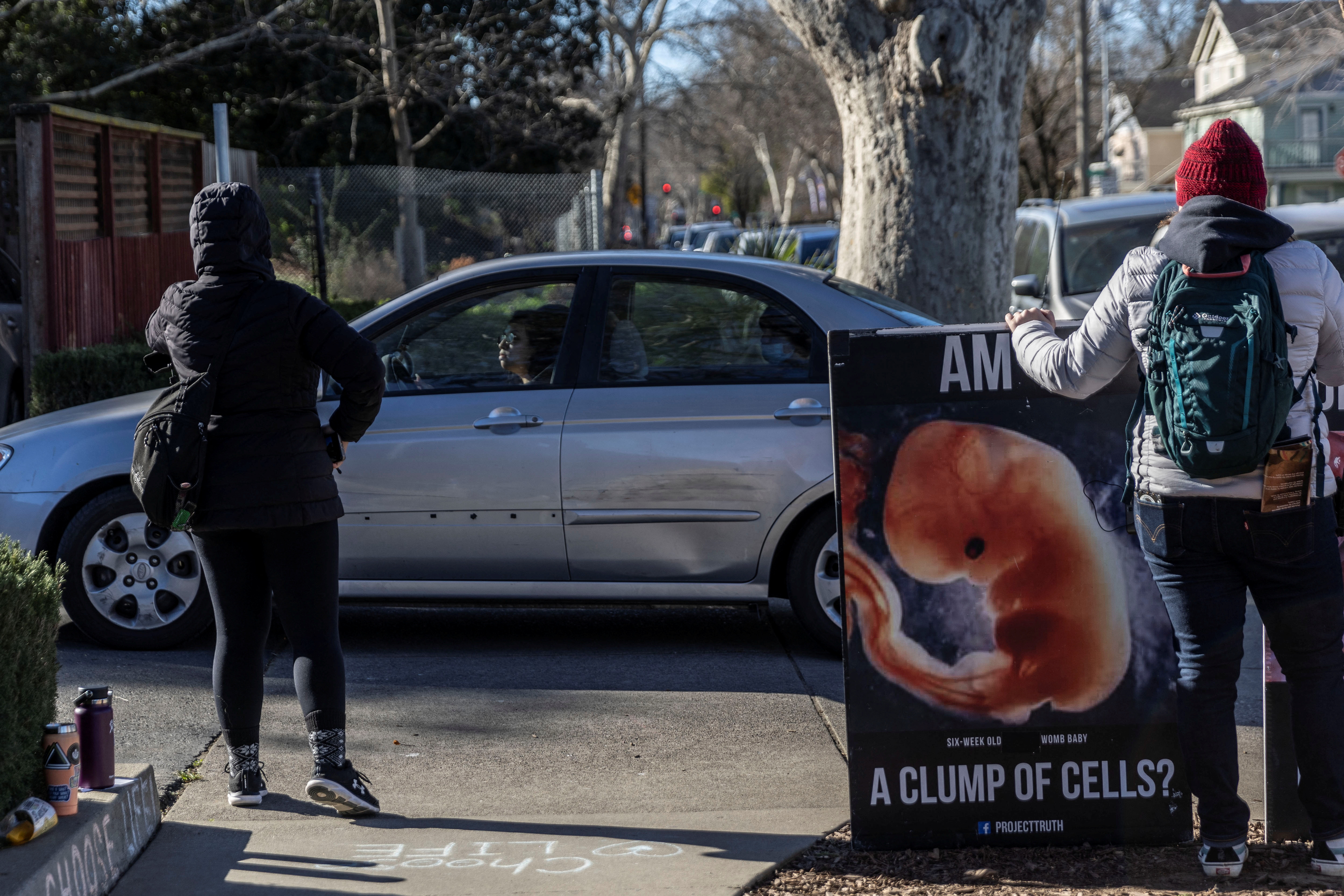 Local residents attend a weekly protest outside the Planned Parenthood Health Center in Sacramento, California