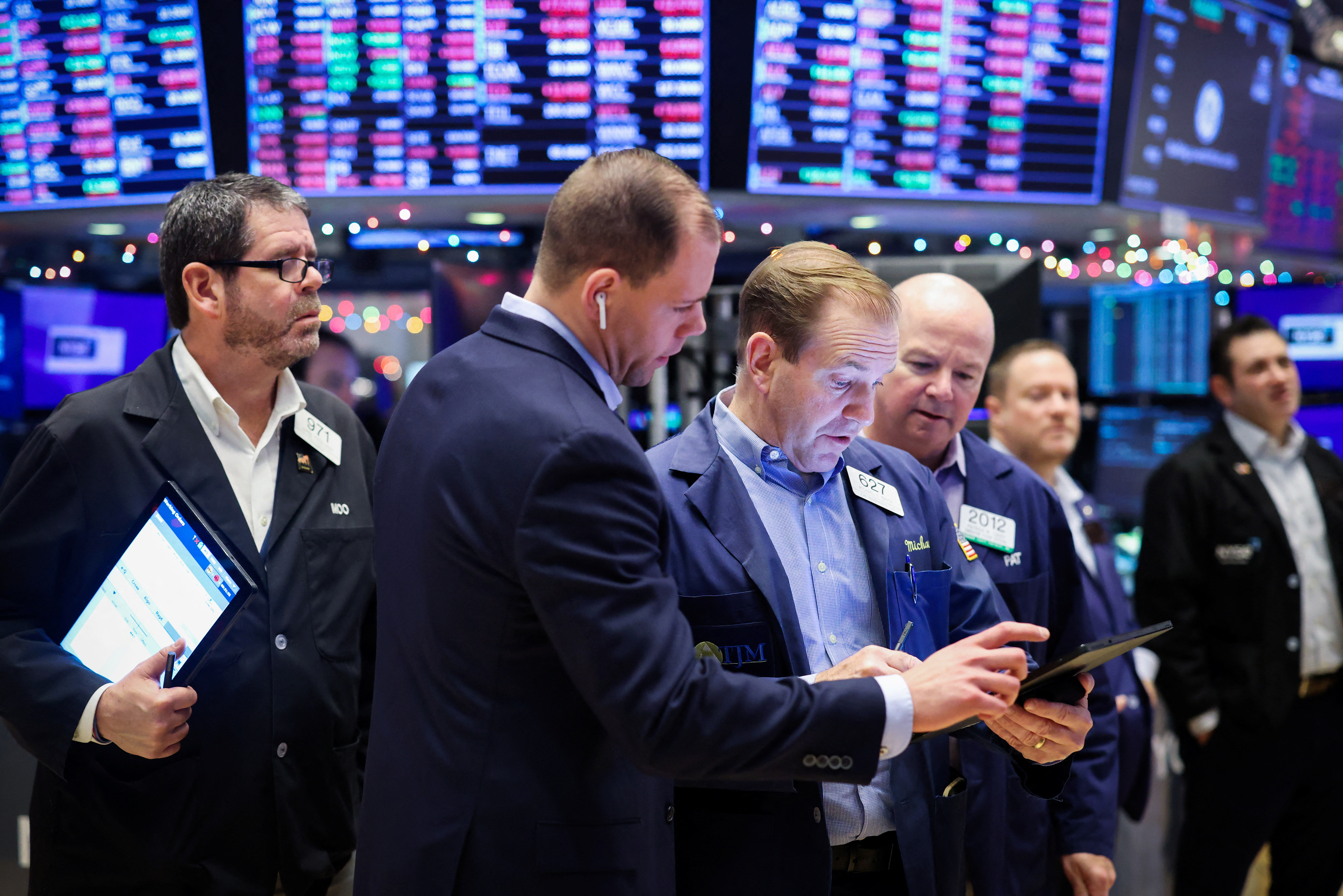 Traders work on the trading floor of the New York Stock Exchange (NYSE) in New York City