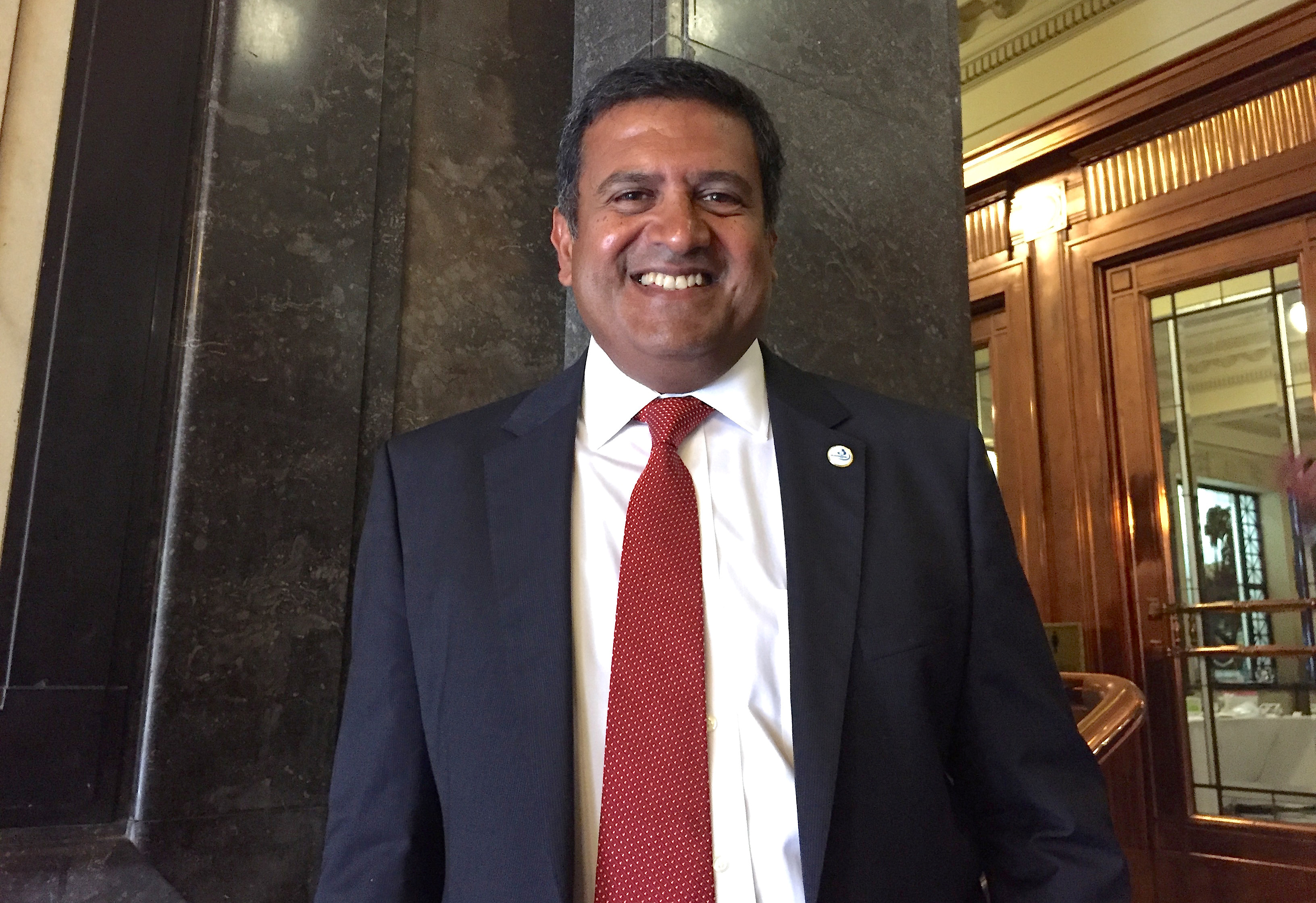 Sandeep Biswas, Chief Executive of Australia's biggest gold miner Newcrest Mining Ltd, poses for a photograph after speaking at the Melbourne Mining Club in Melbourne, Australia