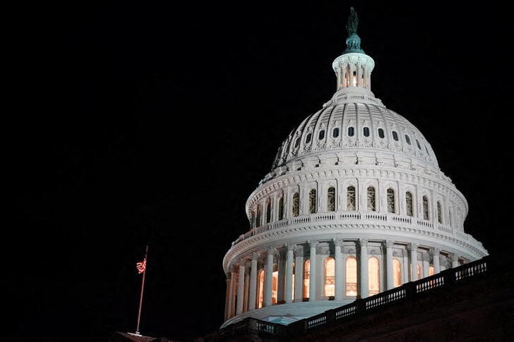 The U.S. Capitol dome is seen at night as the Senate continues debate of voting rights legislation in Washington