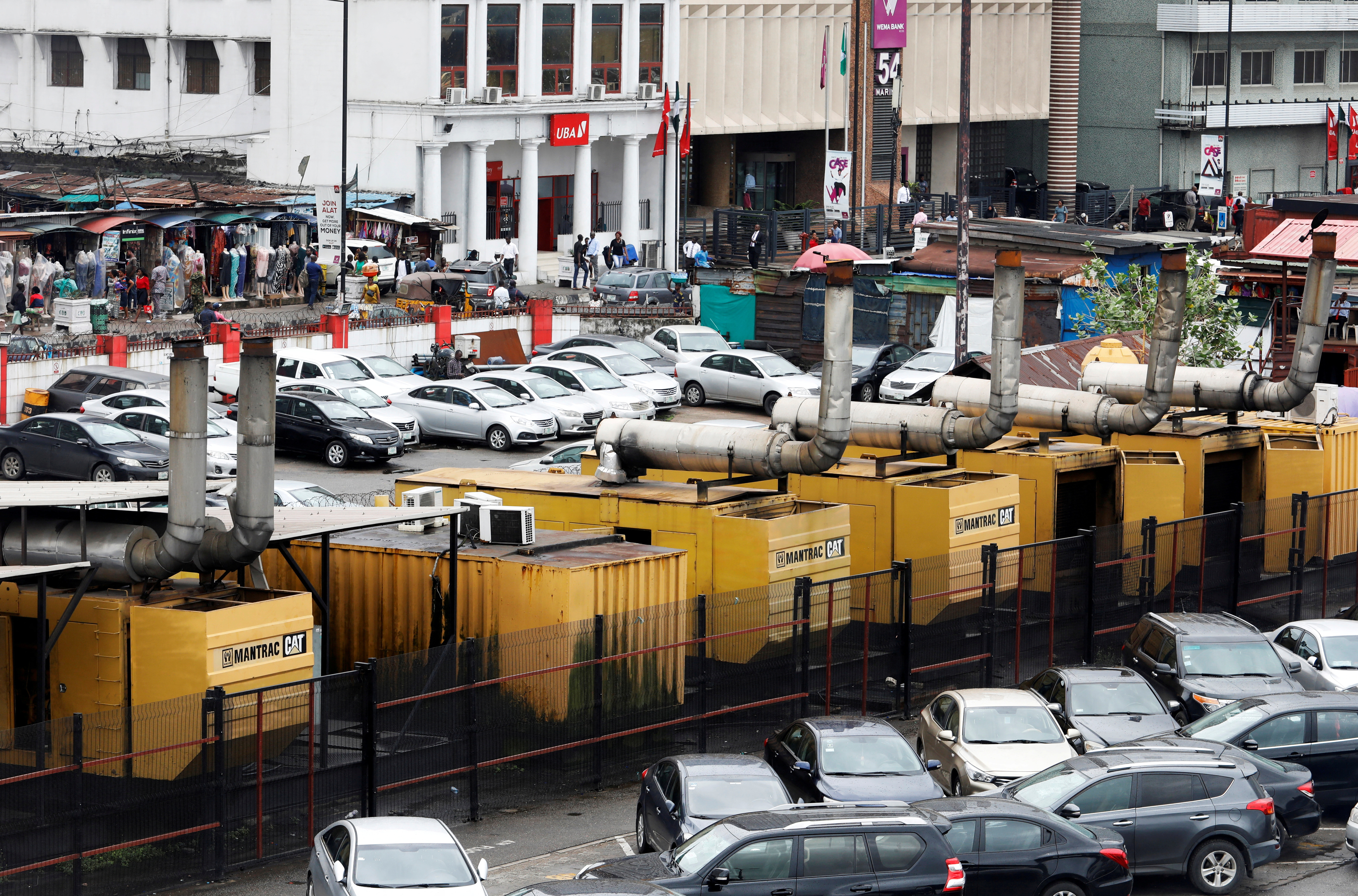 Diesel-run generators are seen in front of United Bank of Africa (UBA) headquarters in Lagos