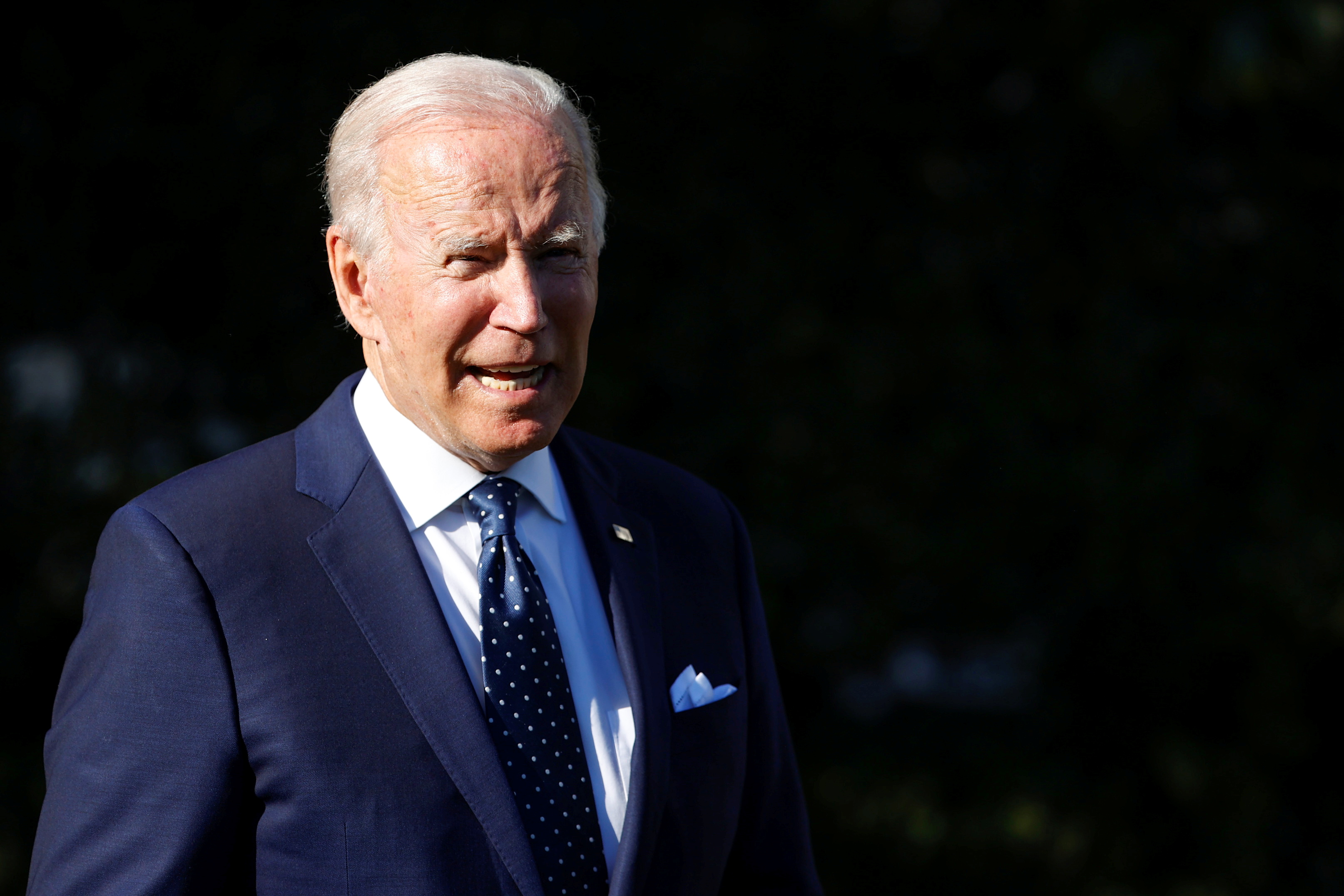 U.S. President Biden speaks briefly with reporters at the White House in Washington
