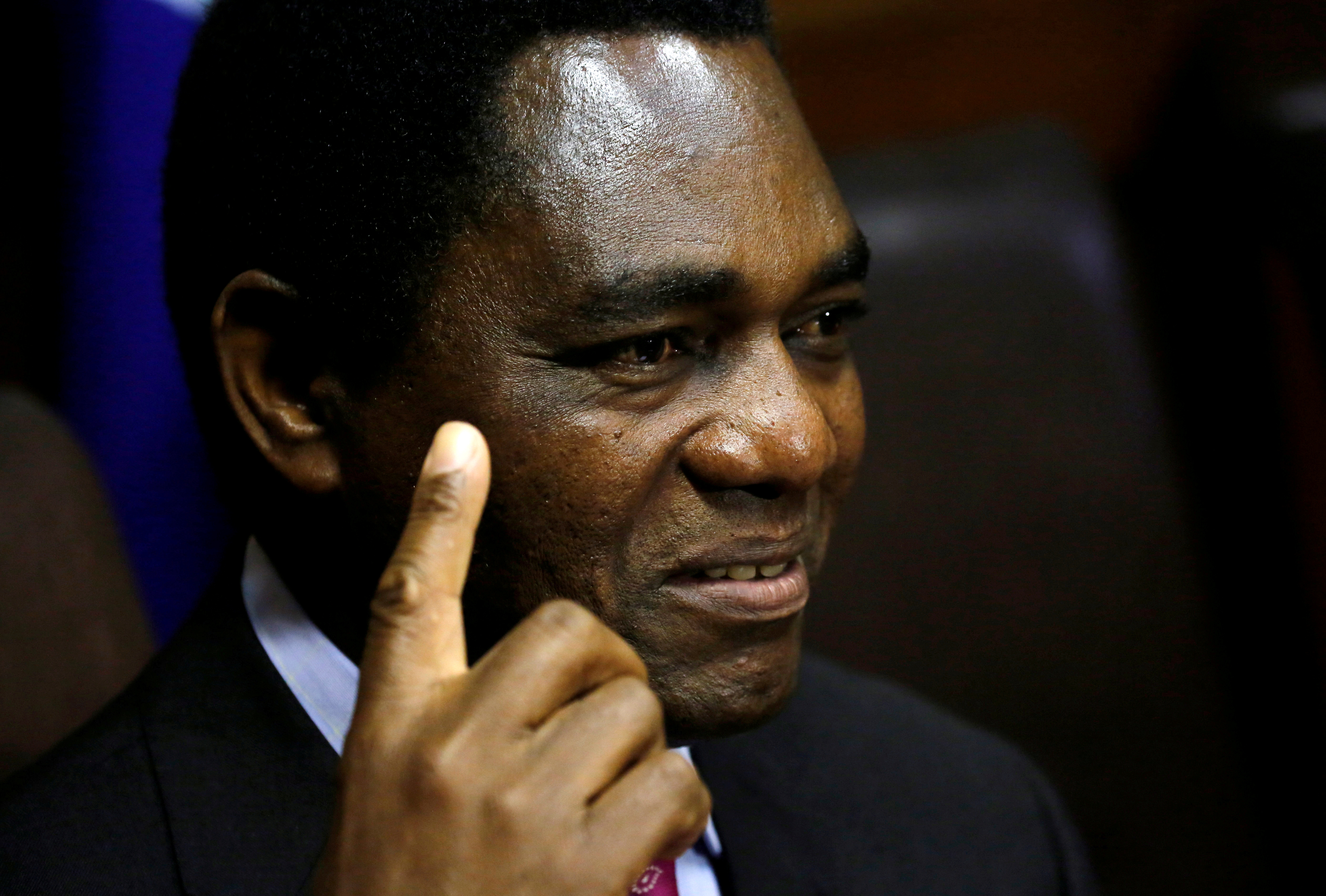 Hakainde Hichilema, leader of ZambiaÕs opposition United Party for National Development (UPND), addresses a media conference in Cape Town