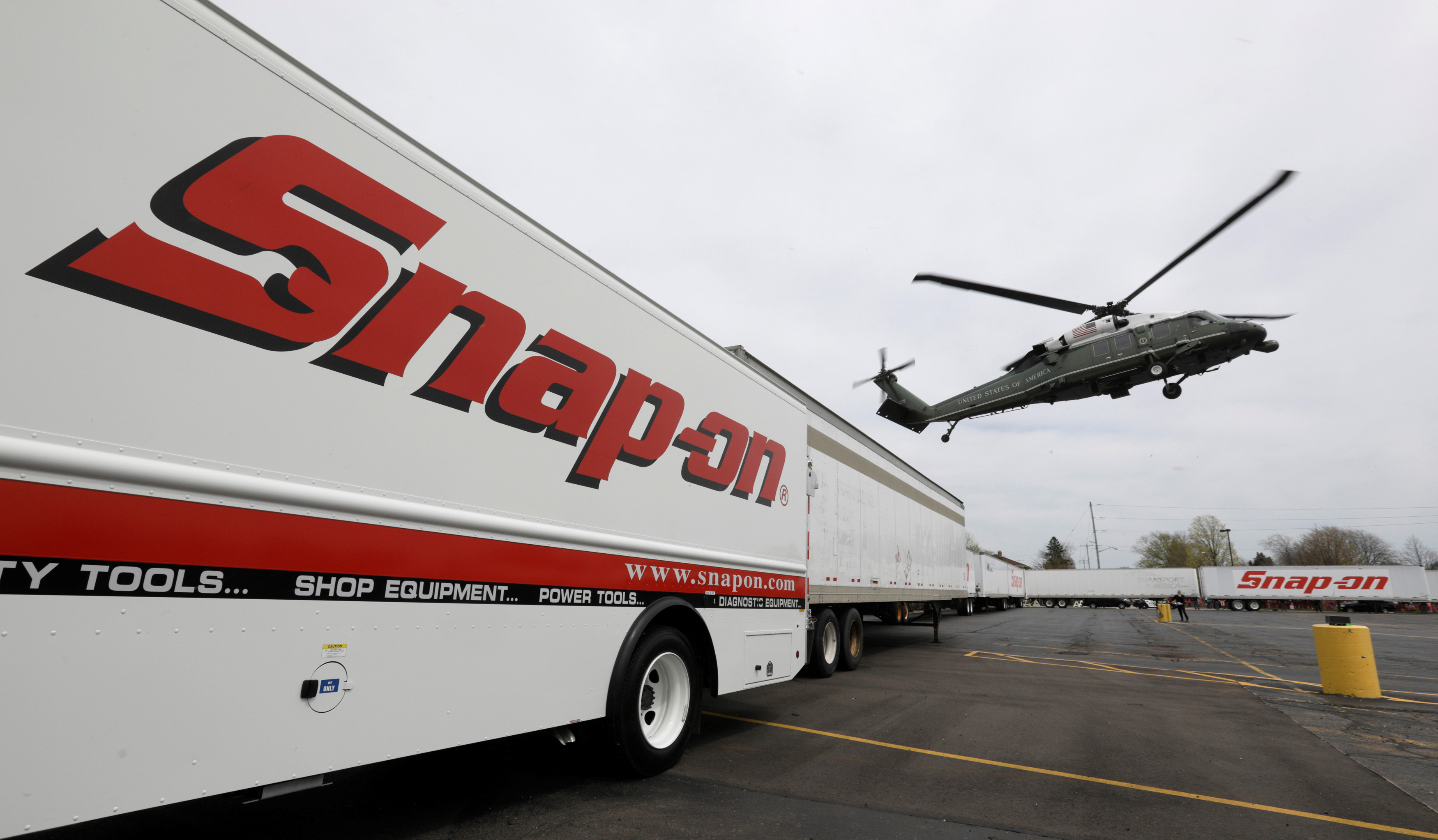 Marine One with U.S. President Donald Trump lands at the world headquarters of Snap-On Inc, a tool manufacturer in Kenosha