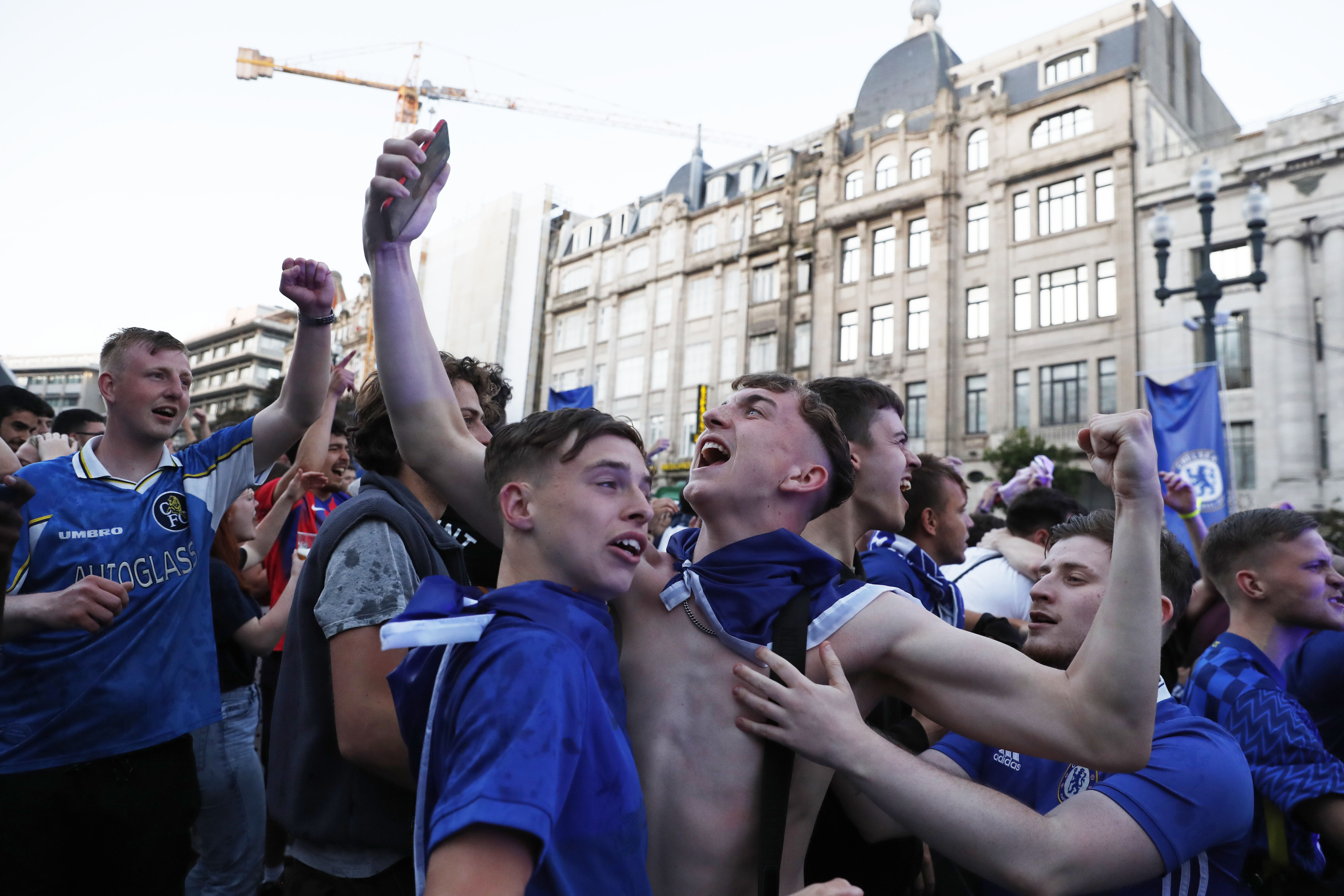 Soccer Football - Champions League - Fans in Porto during the Champions League Final Manchester City v Chelsea - Porto, Portugal - May 29, 2021 Chelsea fans celebrate after Kai Havertz scored their first goal REUTERS/Pedro Nunes