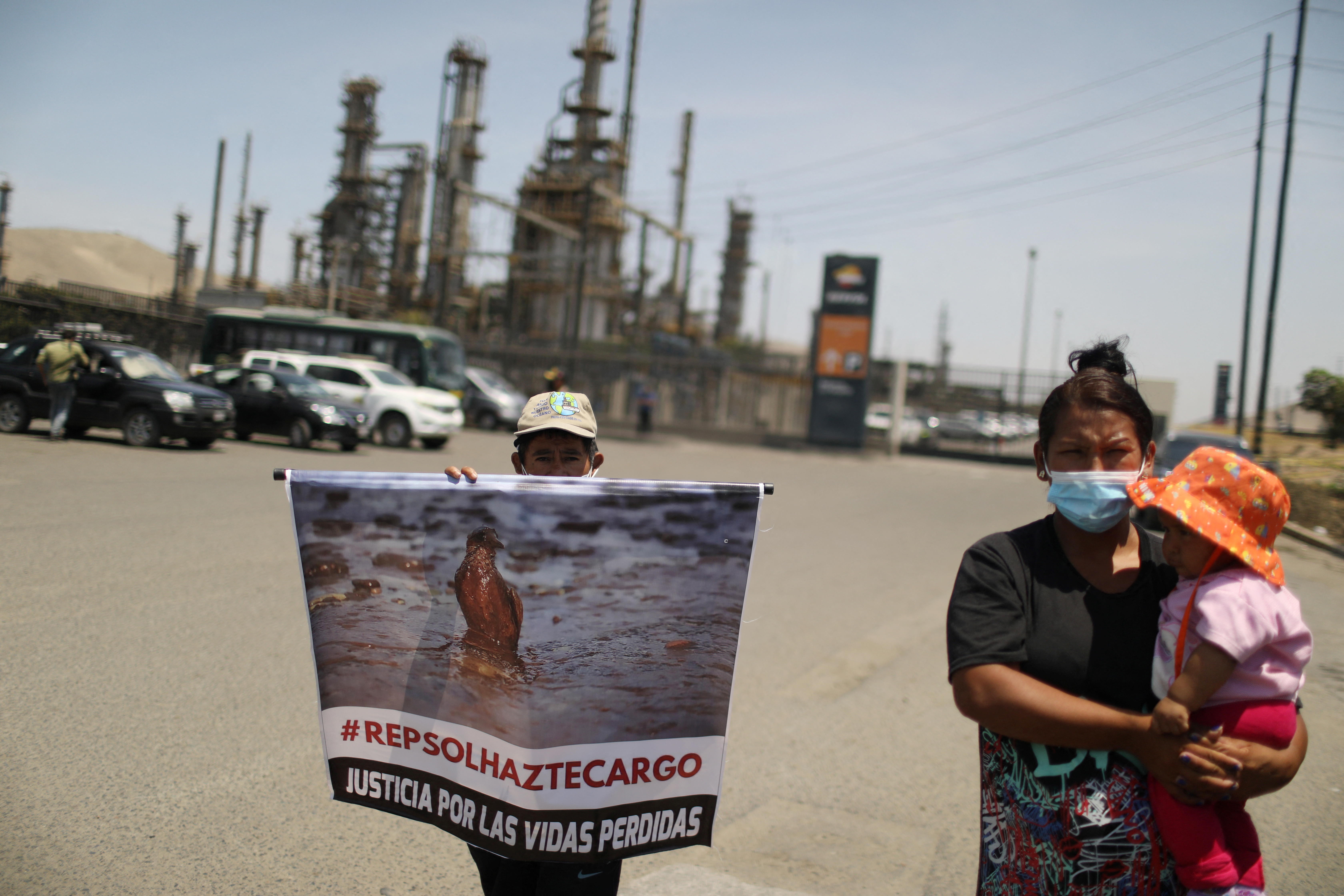 Protest outside Repsol's La Pampilla refinery against the recent oil spill, in Ventanilla