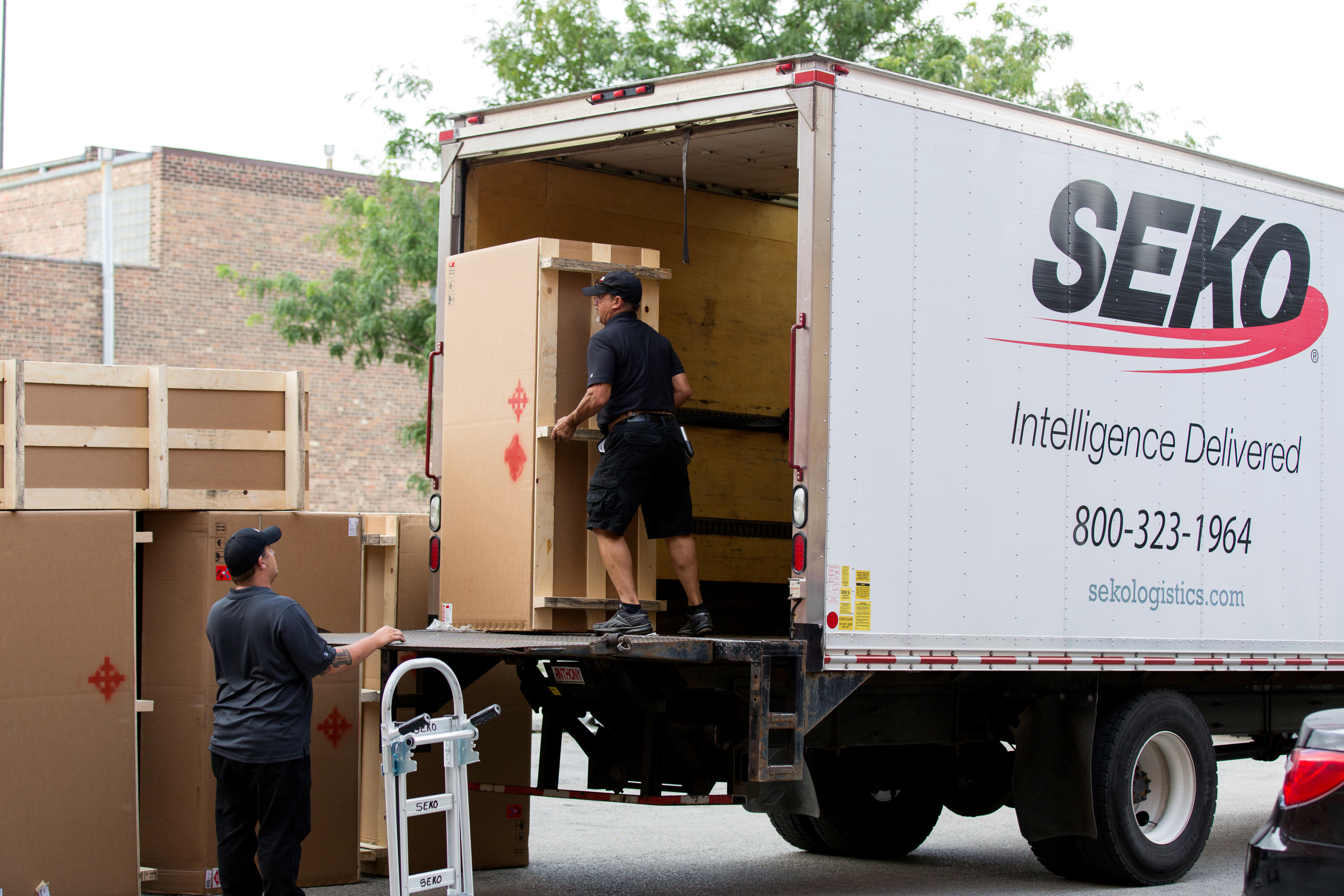 SEKO Logistics employees deliver a package in Chicago