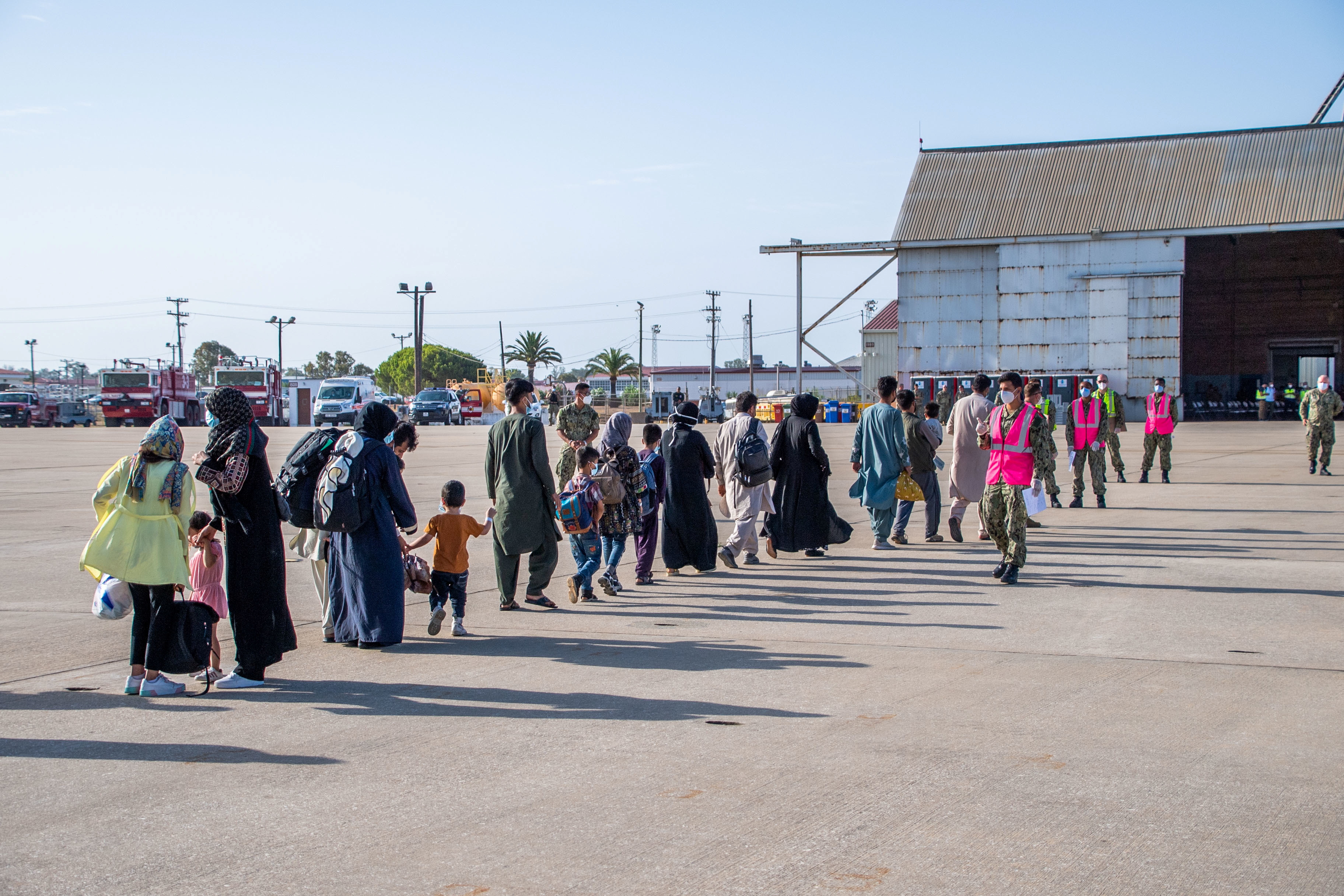 Evacuees from Afghanistan arrive for processing at Naval Station Rota