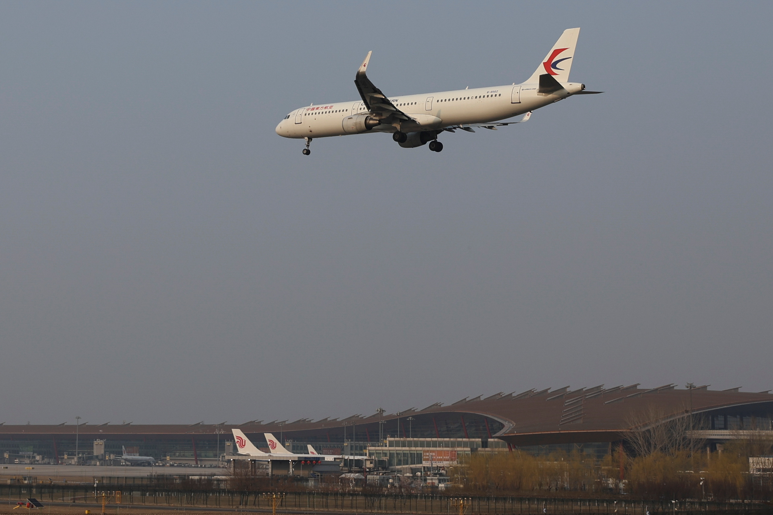 Plane of China Eastern Airlines lands at the Beijing Capital International Airport in Beijing