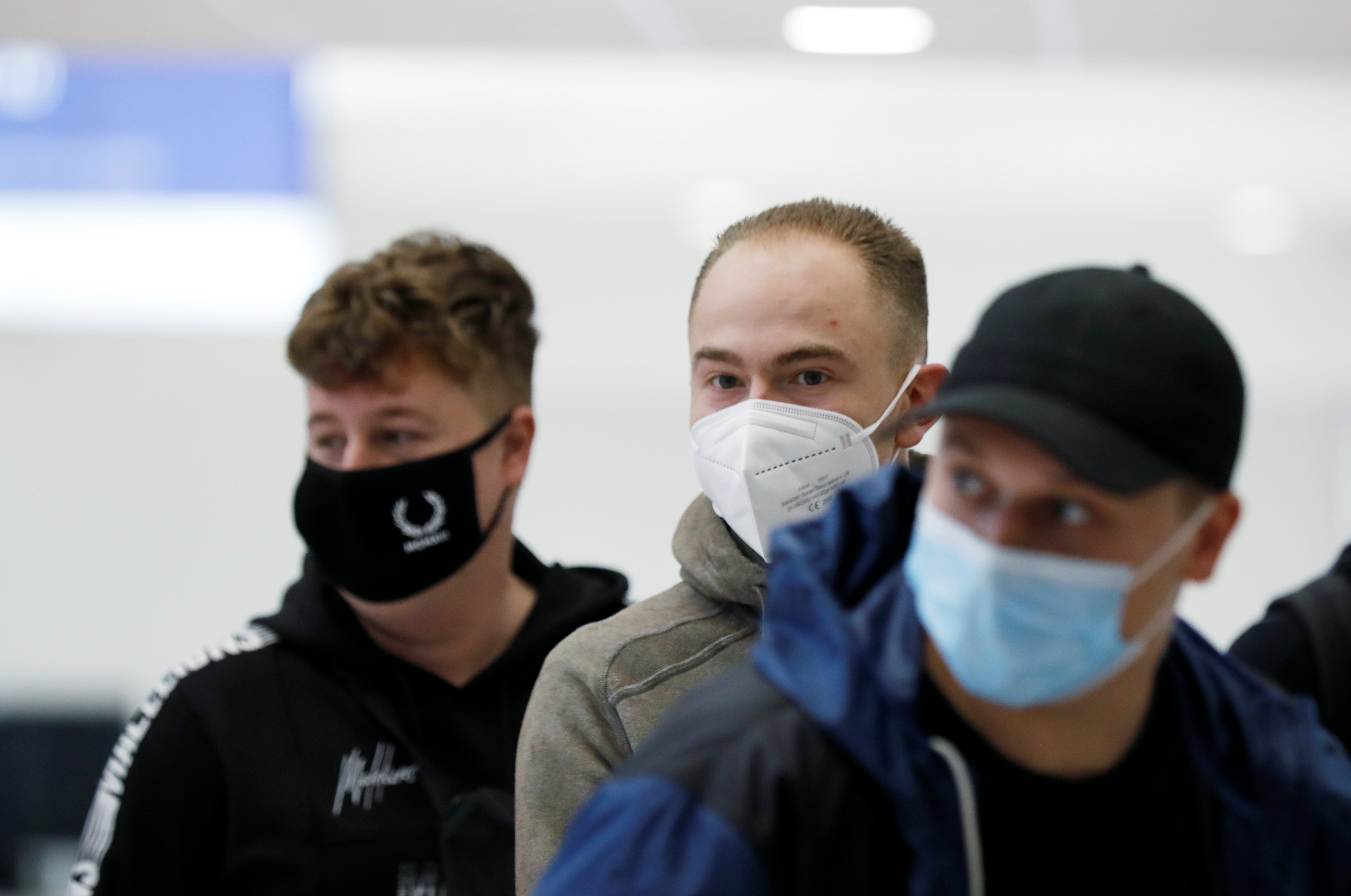 Dutch tourists, who will spend a week long holiday in isolation in their tourist resort as part of an experiment, arrive at the Rhodes International Airport, amid the coronavirus disease (COVID-19) outbreak on the island of Rhodes, Greece April 12, 2021. REUTERS/Louiza Vradi