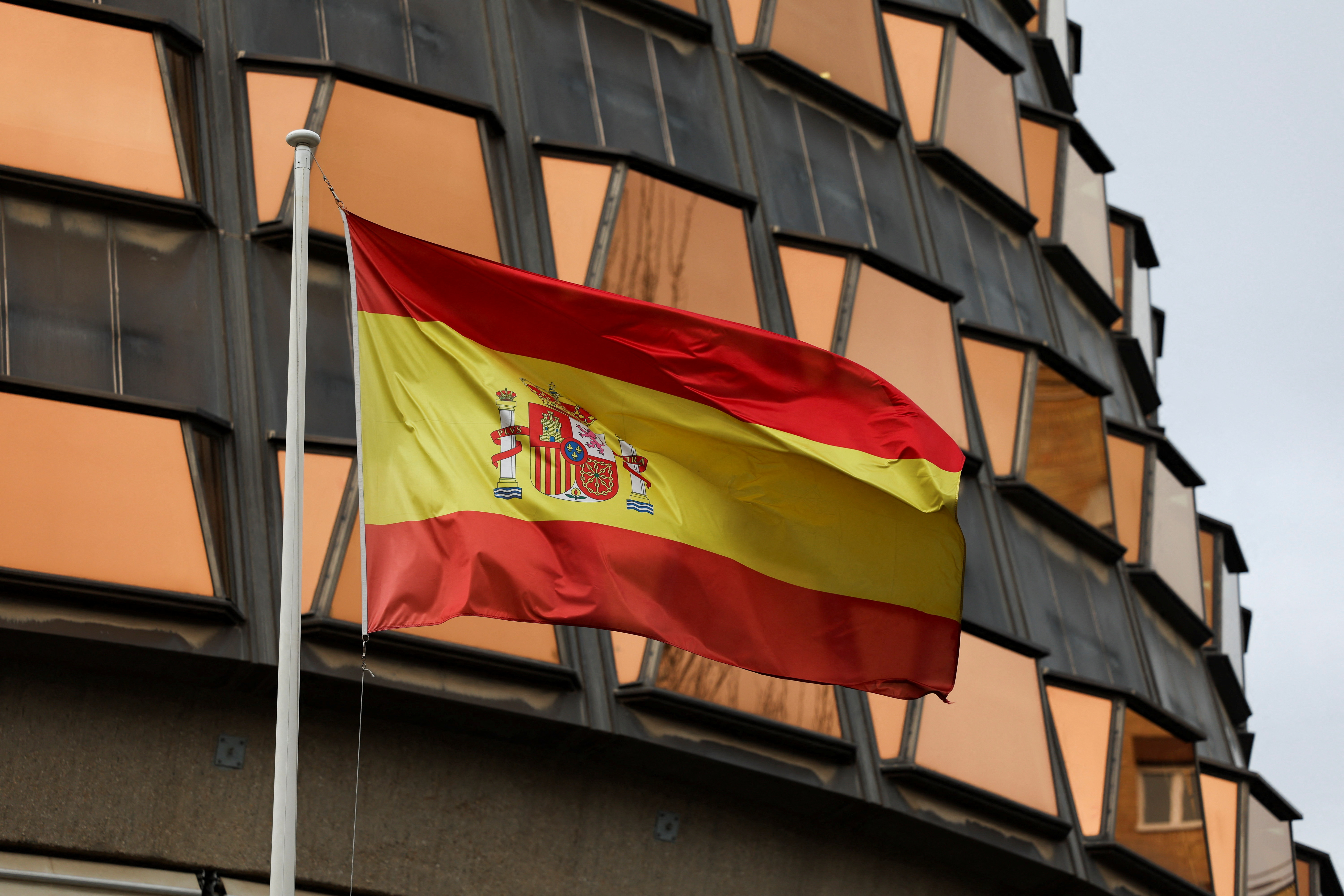 The Spanish flag is seen outside the Constitutional Court building in Madrid